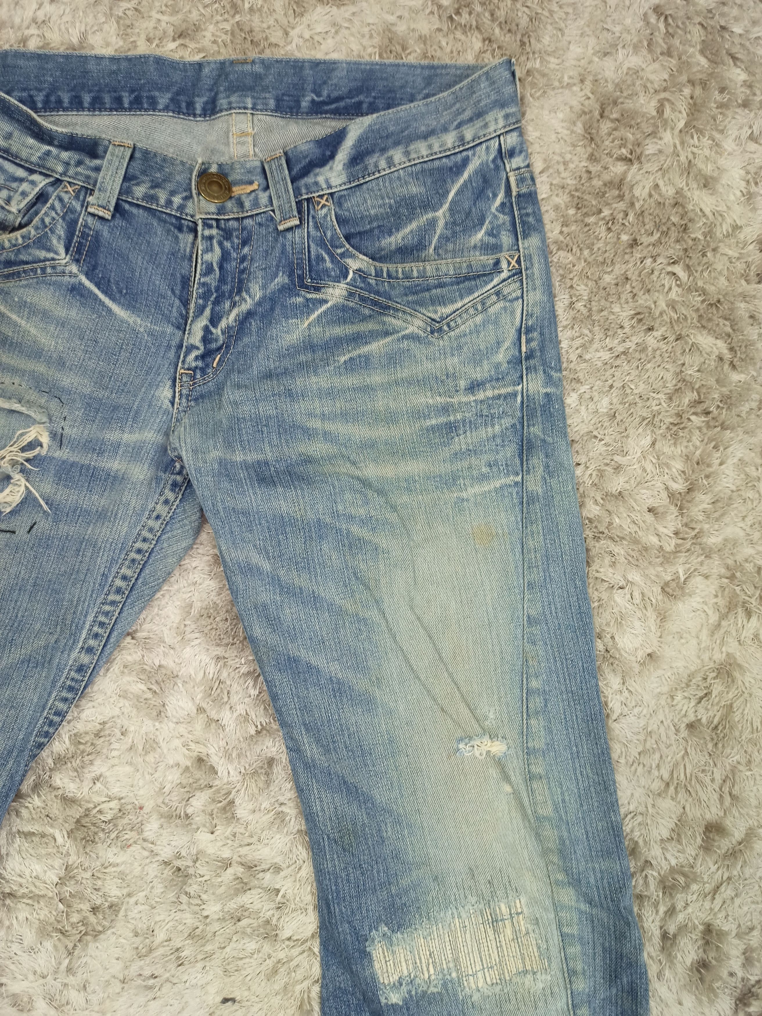 Vintage Rattle Trap Distressed Mudwash Flare Jeans