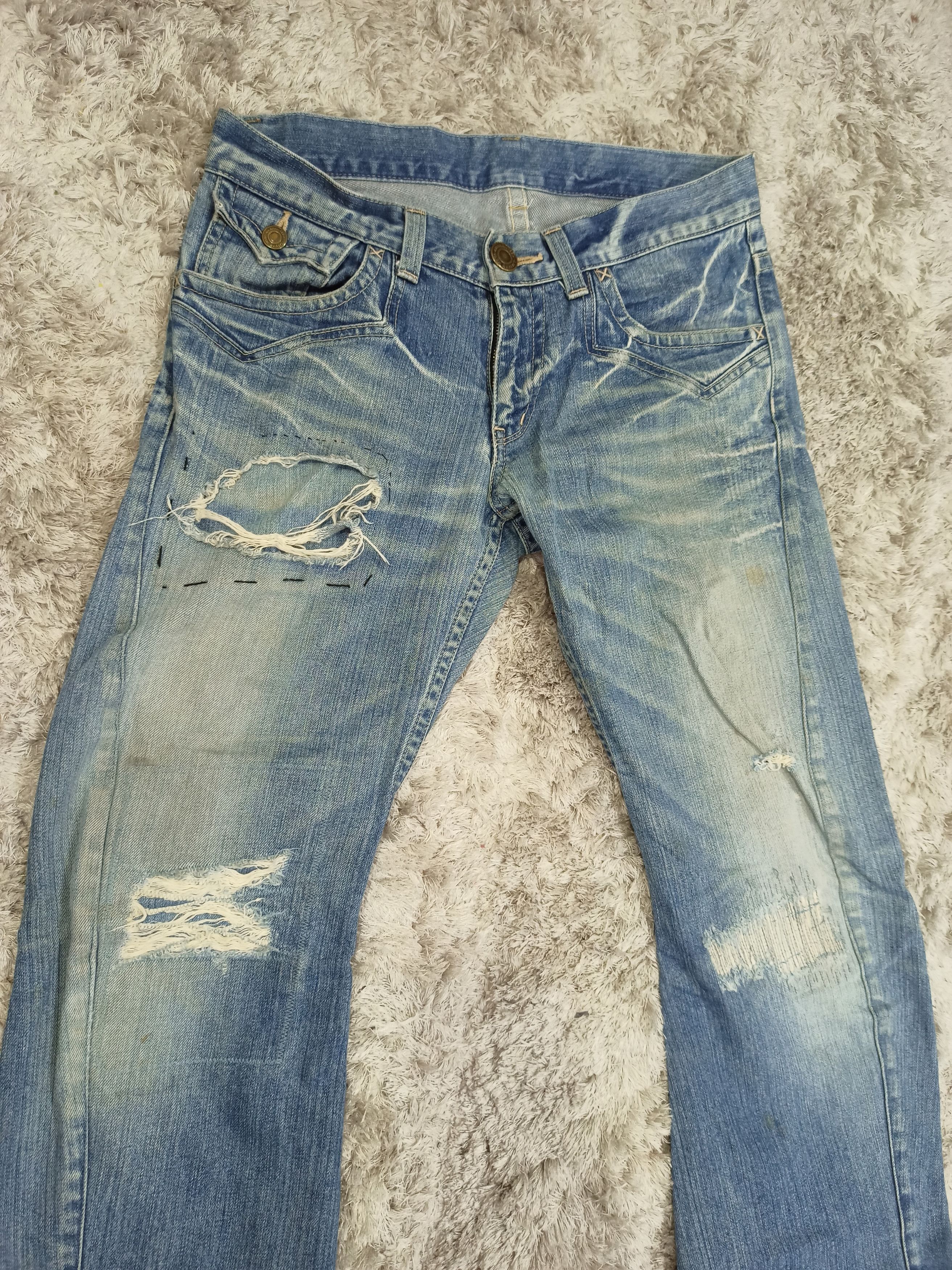 Vintage Rattle Trap Distressed Mudwash Flare Jeans