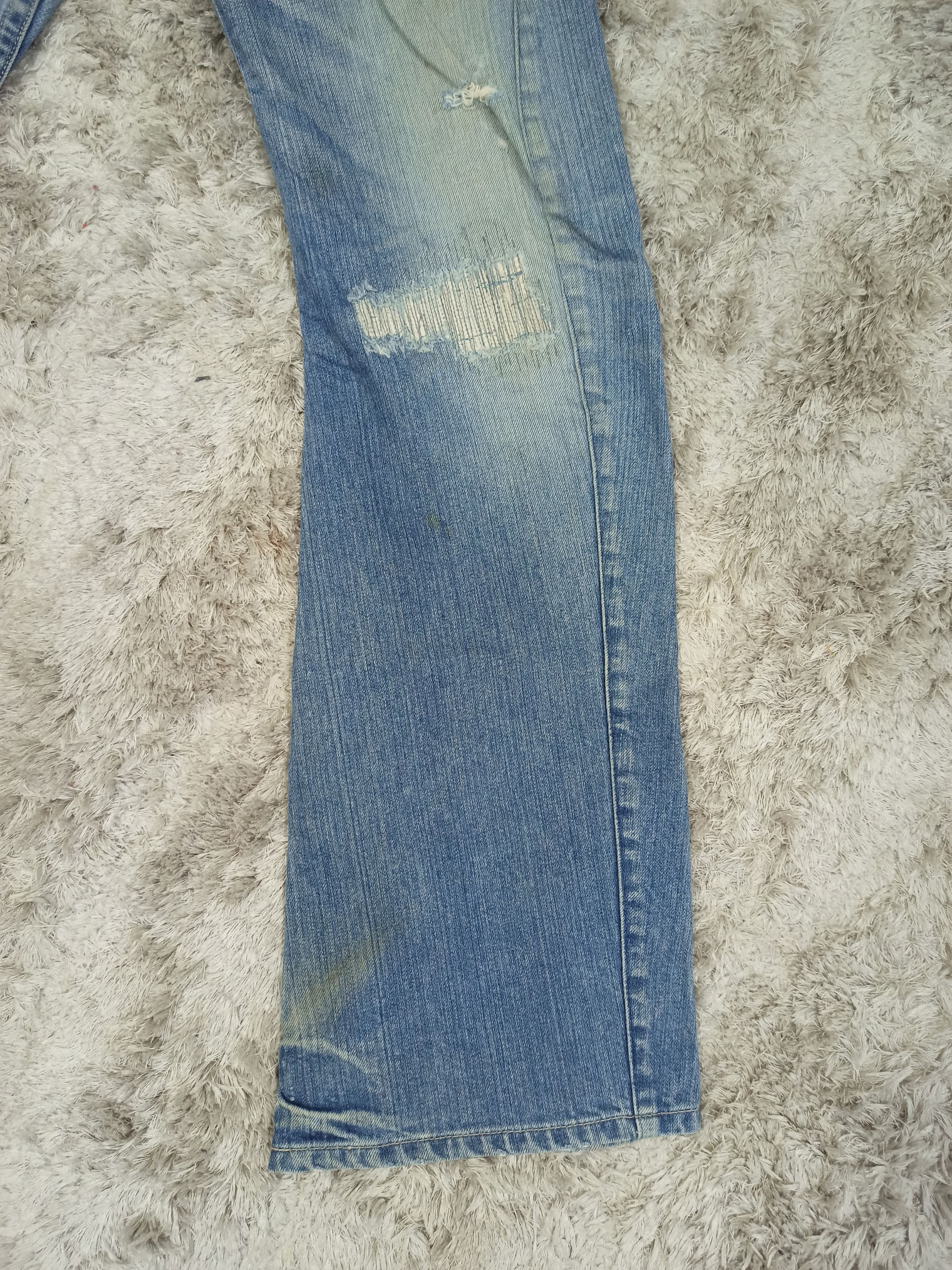 Vintage Rattle Trap Distressed Mudwash Flare Jeans