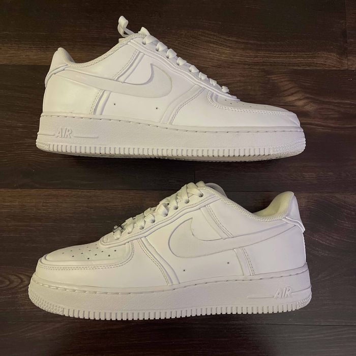 Air force 1 john elliott best sale triple white