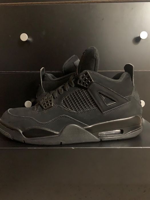 mens black cat 4s