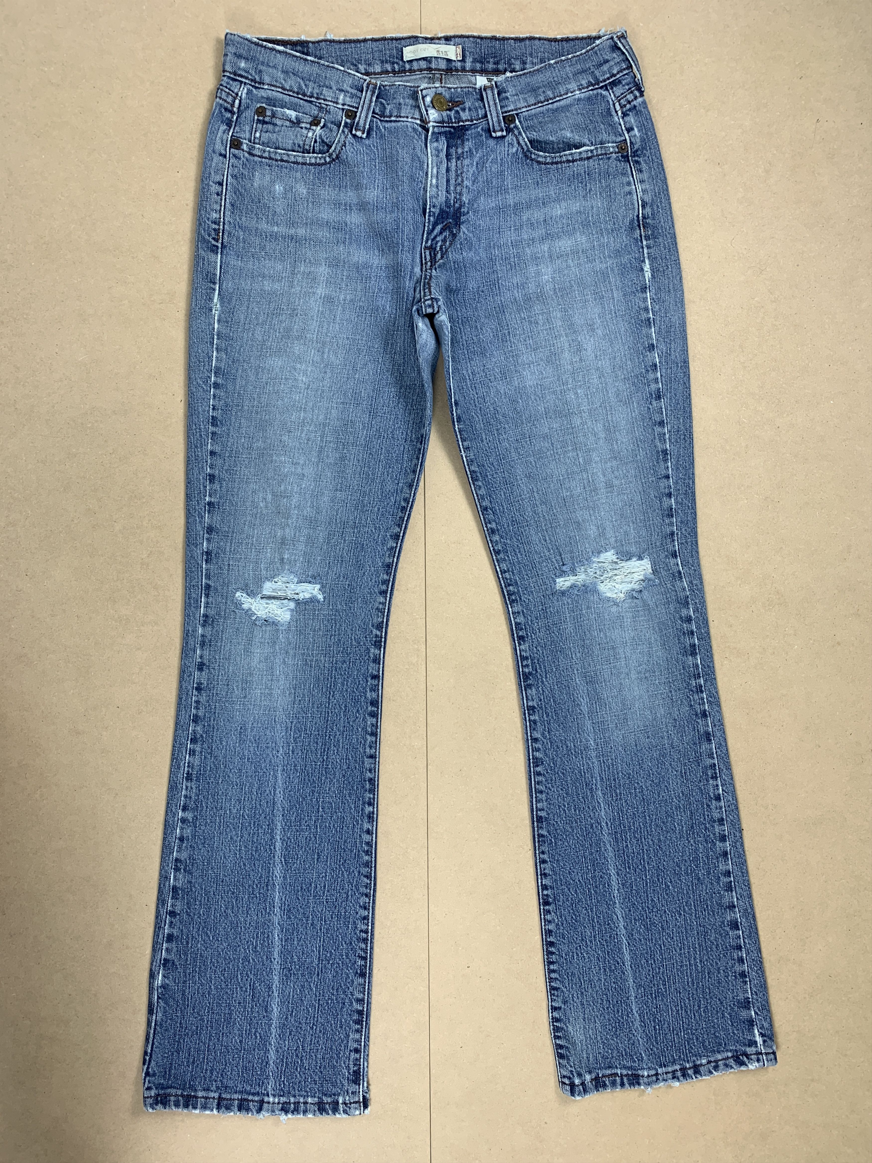 image of Levis 515 Boot Cut Distressed Faded Mid Wash Jeans in Midwash, Women's (Size 32)