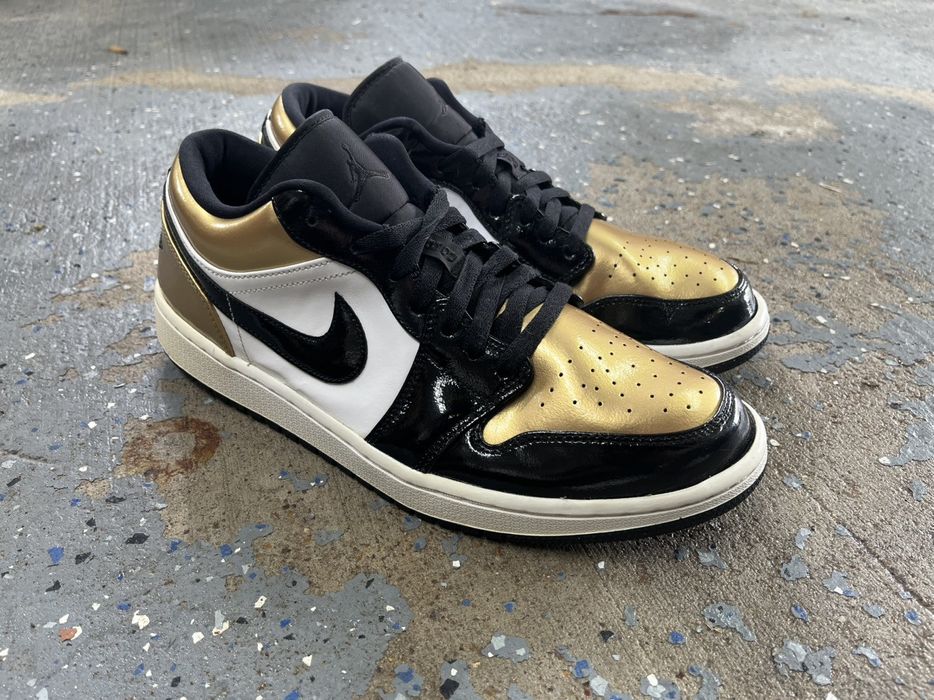 low top gold jordans