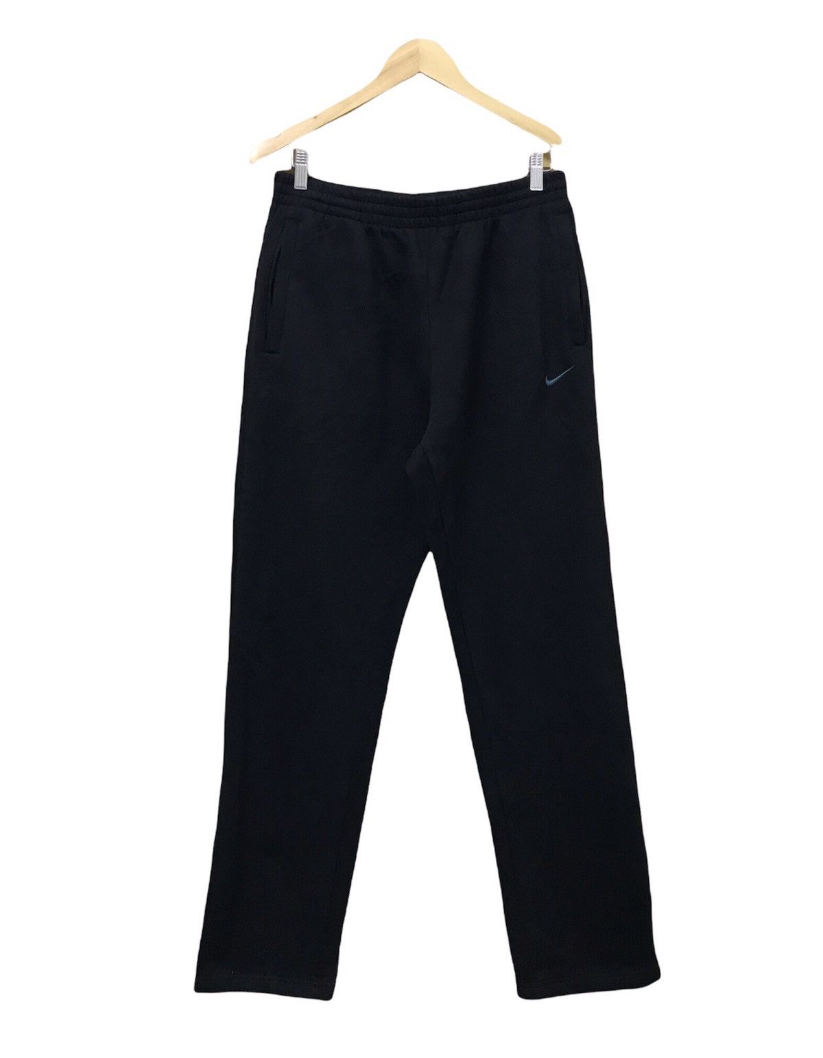 image of Nike Small Swoosh Sweatpants in Black, Men's (Size 31)
