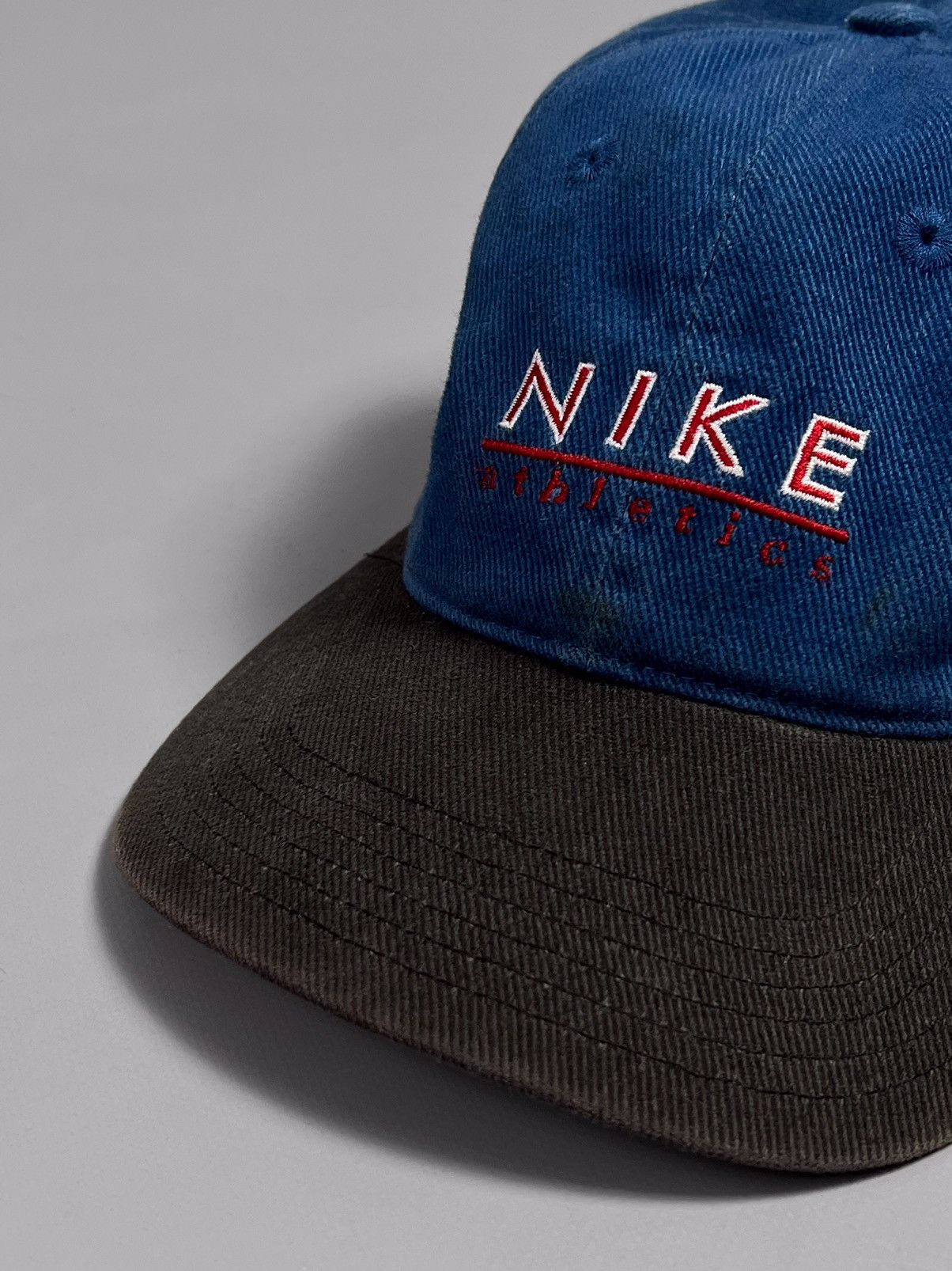 Nike × Vintage Vintage 90s Nike Athletics Cap SnapBack Size ONE SIZE - 1 Thumbnail