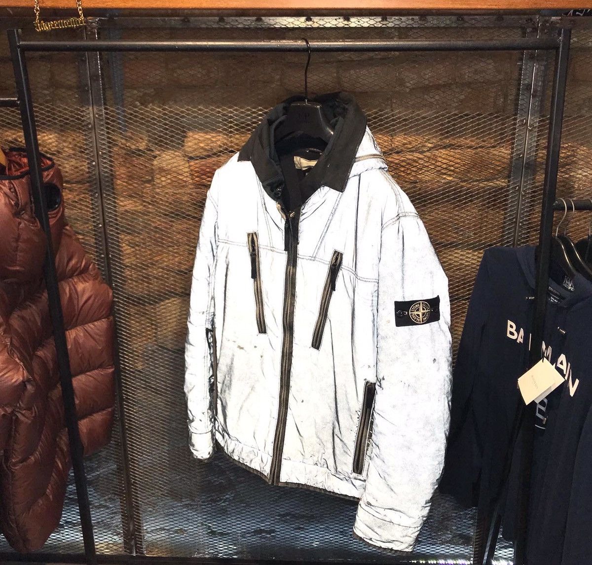 Stone island store liquid reflective jacket