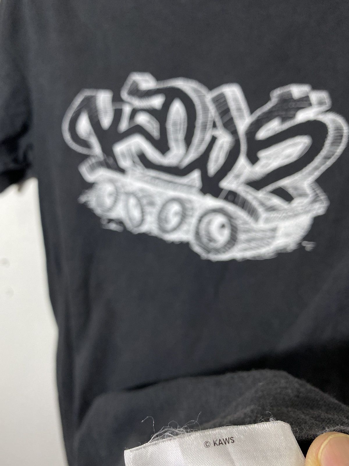 Kaws × Uniqlo kaws x uniqlo spell out Size US M / EU 48-50 / 2 - 4 Thumbnail
