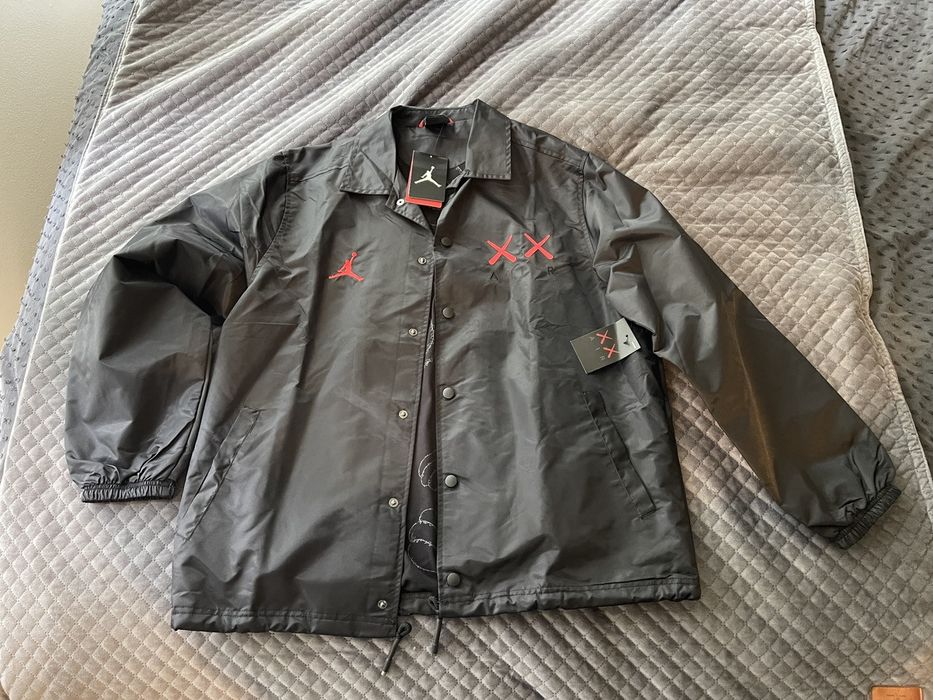 Jordan kaws best sale coach jacket