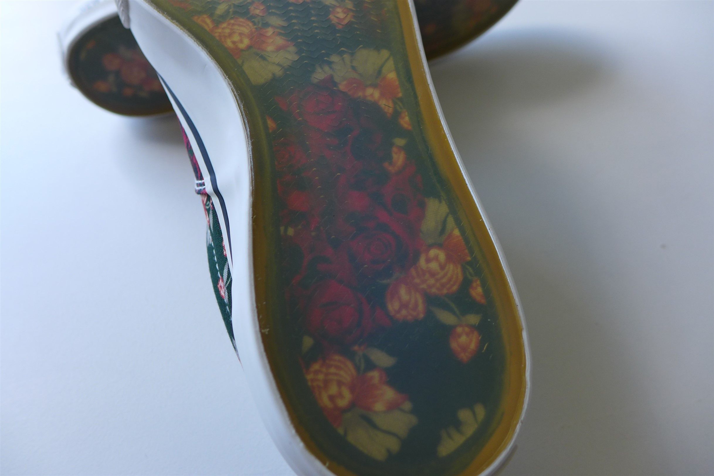 Undercover Floral Canvas Sneakers.