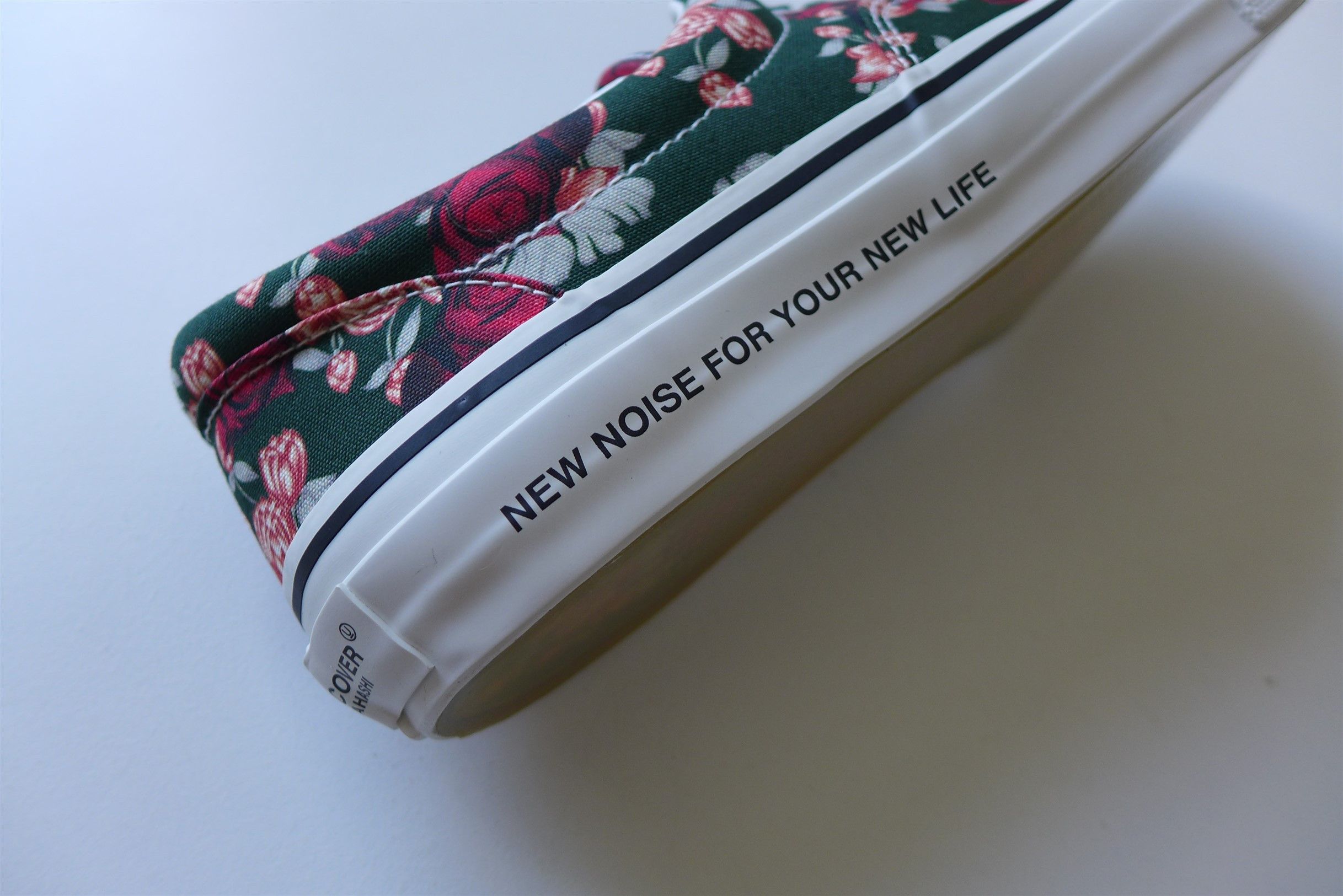 Undercover Floral Canvas Sneakers.