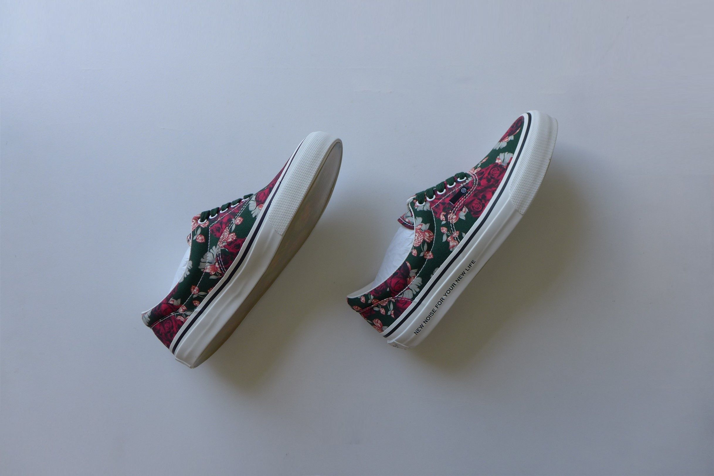 Undercover Floral Canvas Sneakers.