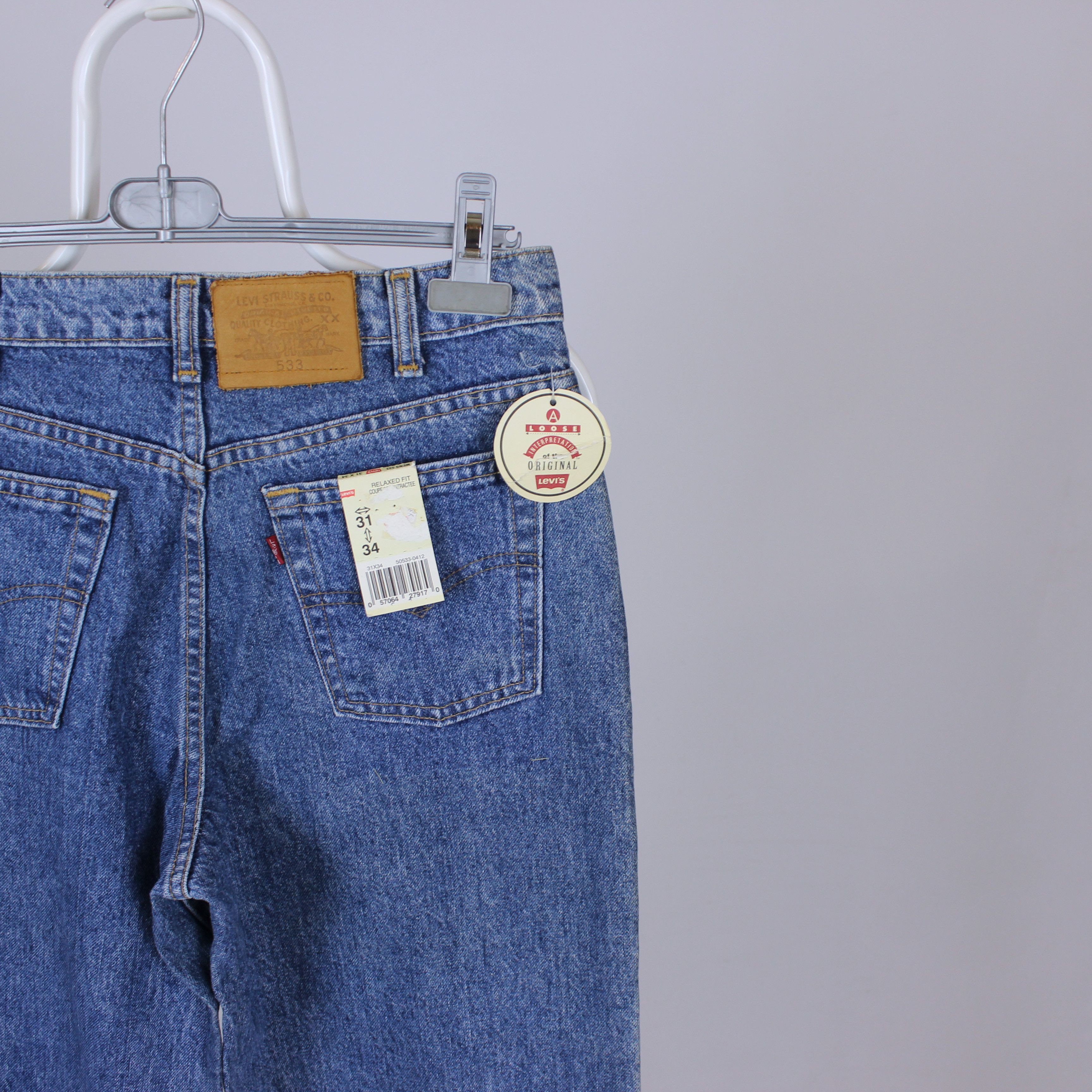 Vintage levis denim jeans 533 31 34 leather patch