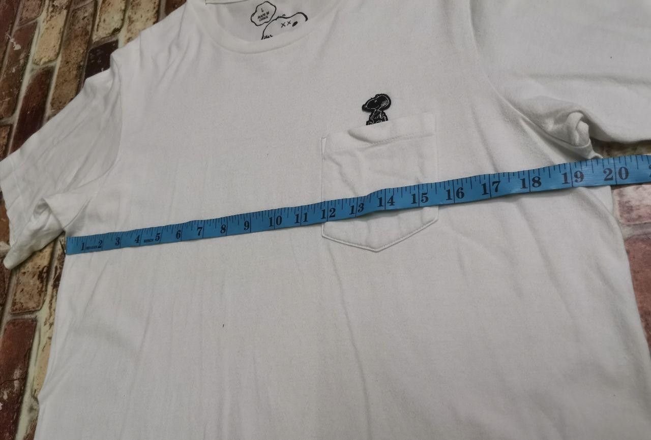 Cartoon Network × Kaws × Vintage Kaws X Peanuts Snoopy Pocket Tee rare Size US L / EU 52-54 / 3 - 4 Thumbnail