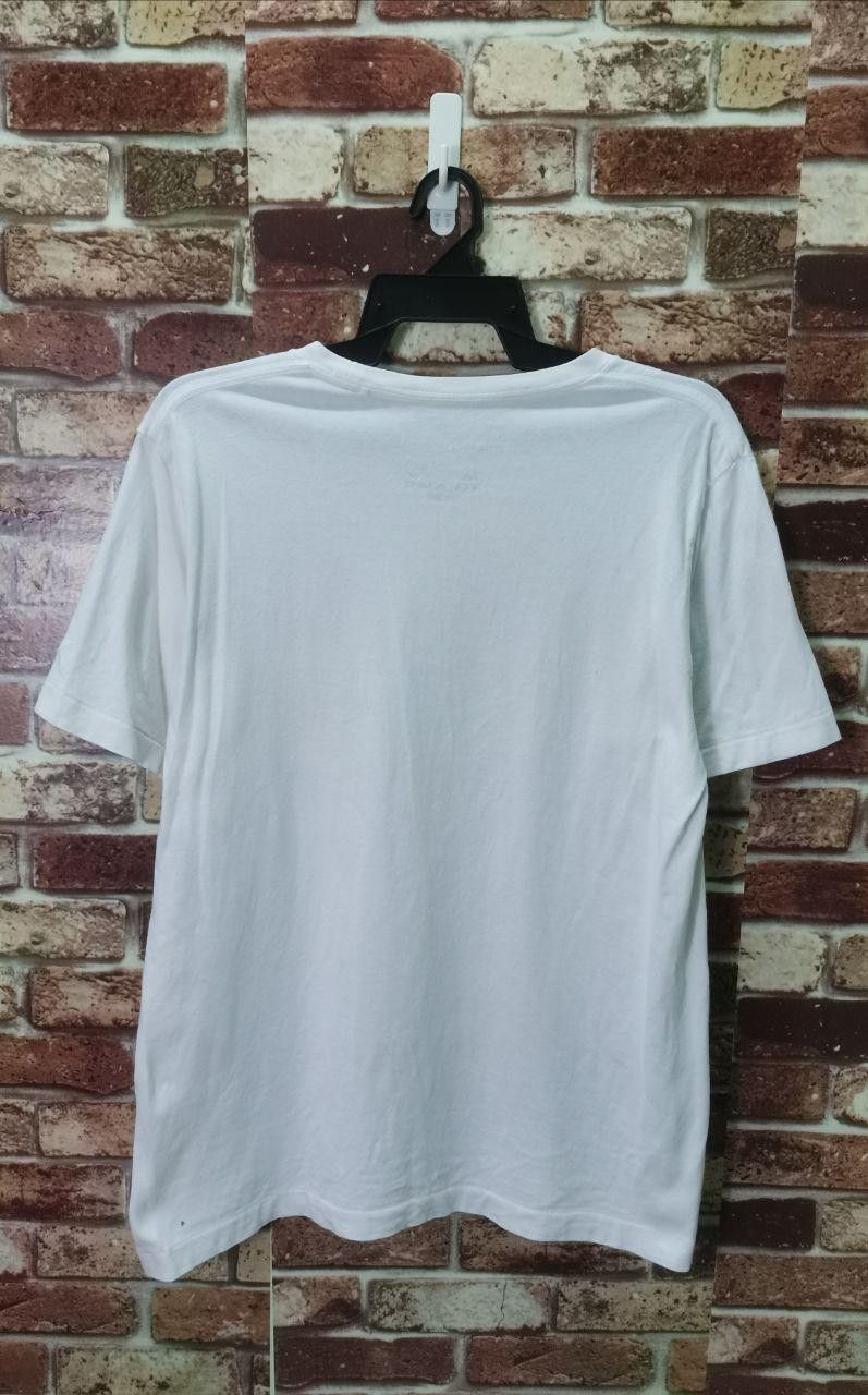 Cartoon Network × Kaws × Vintage Kaws X Peanuts Snoopy Pocket Tee rare Size US L / EU 52-54 / 3 - 6 Thumbnail