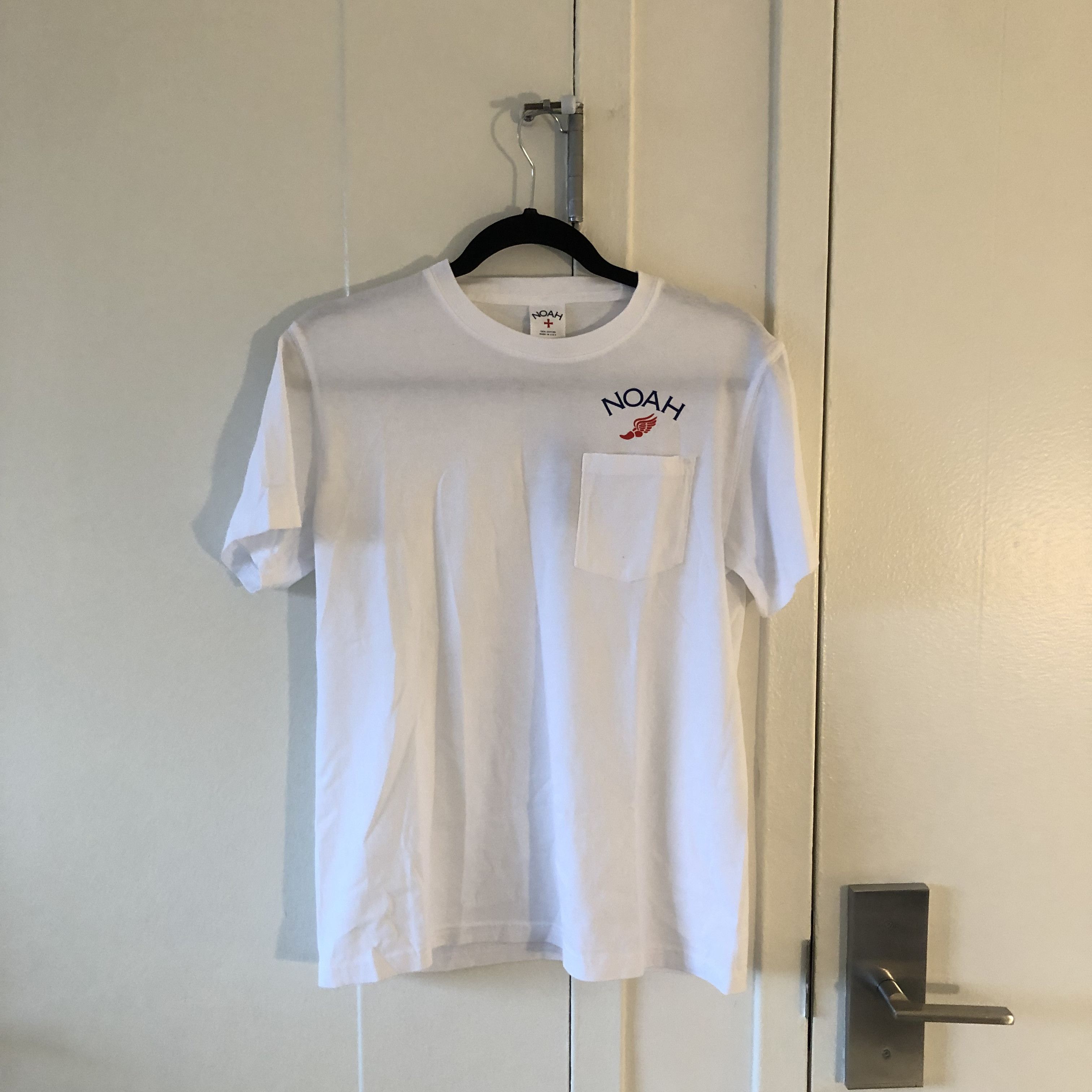 image of Noah Winged Foot Pocket Tee in White, Men's (Size Small)