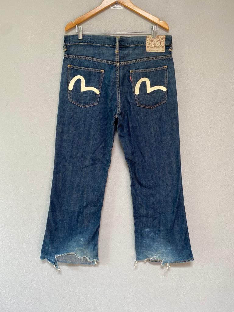 Evisu washed distressed jeans