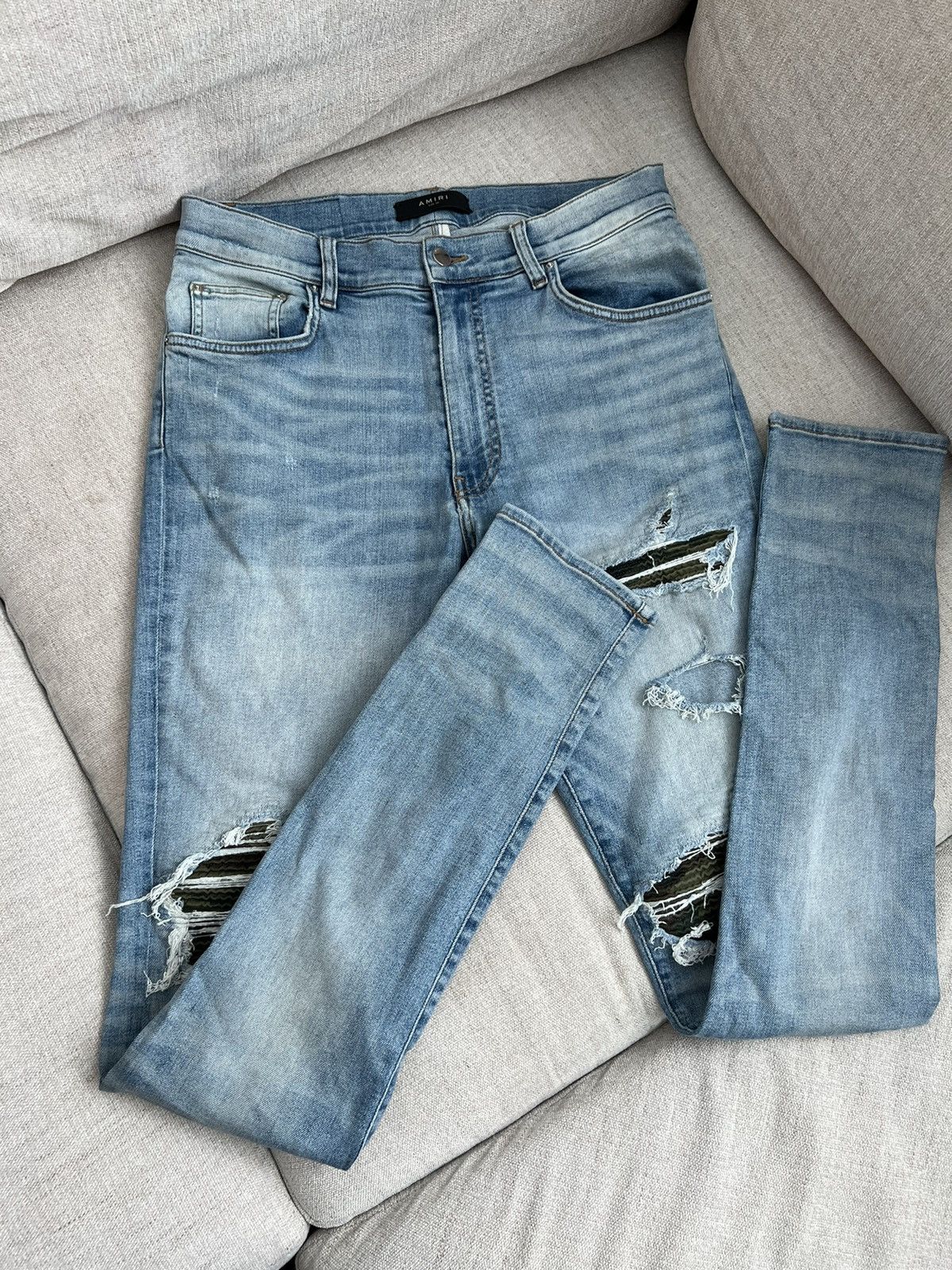 Amiri light camo patch jeans
