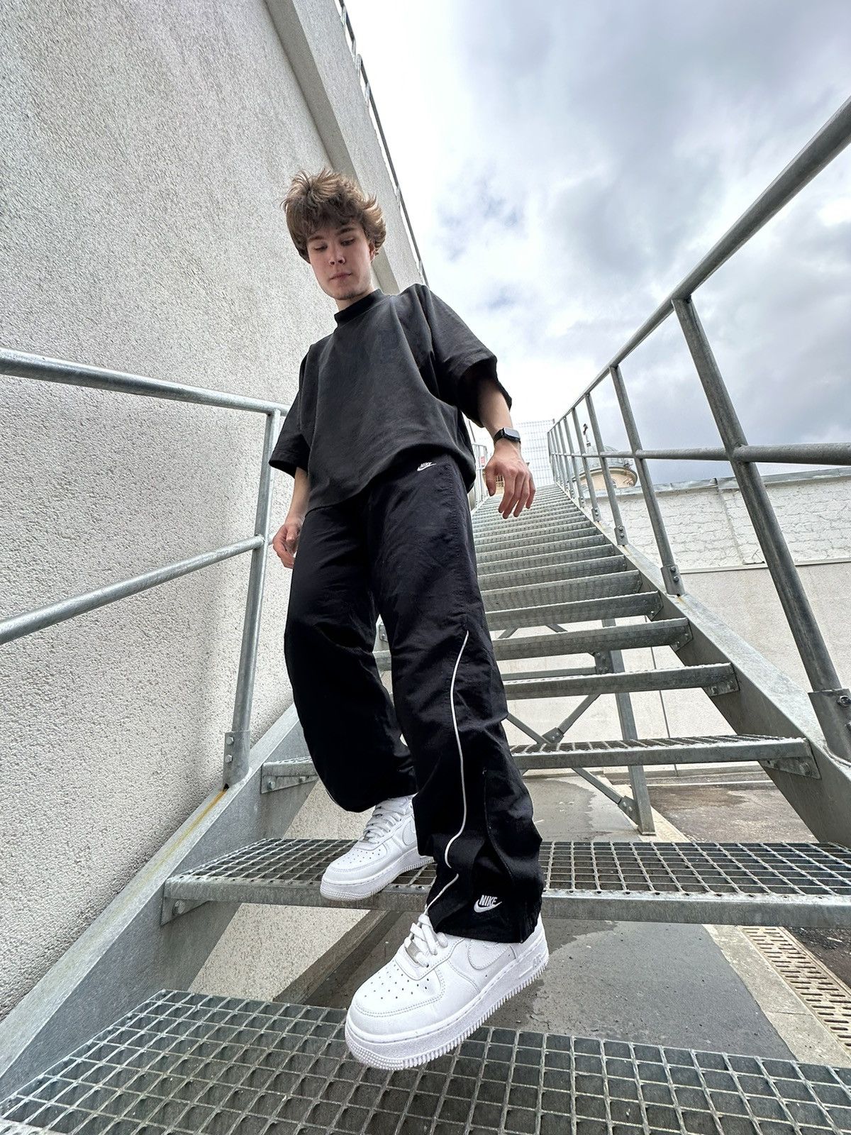 double swoosh track pants