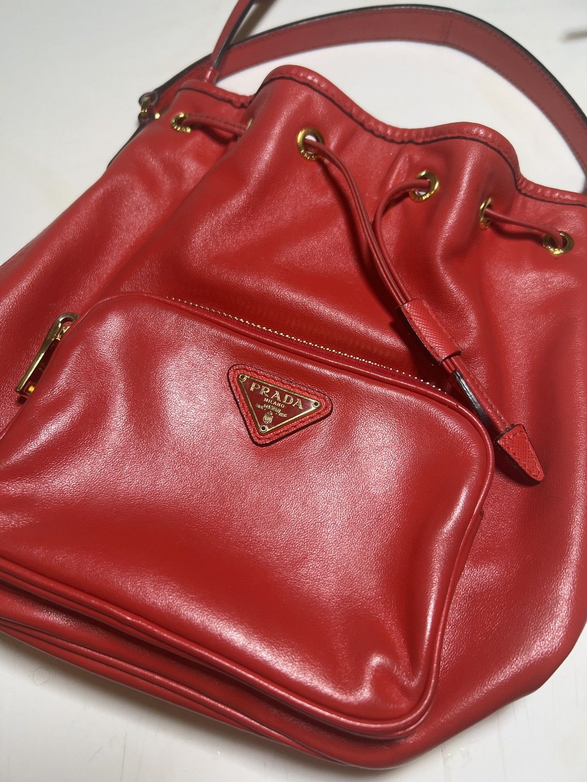 Prada bucket bag red sale