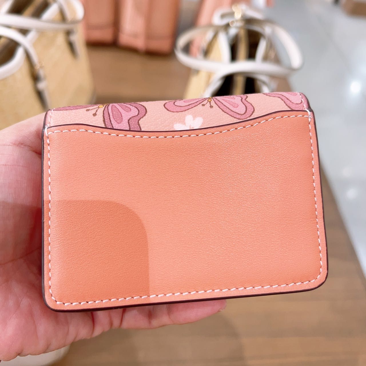 Coach butterfly wallet pink sale