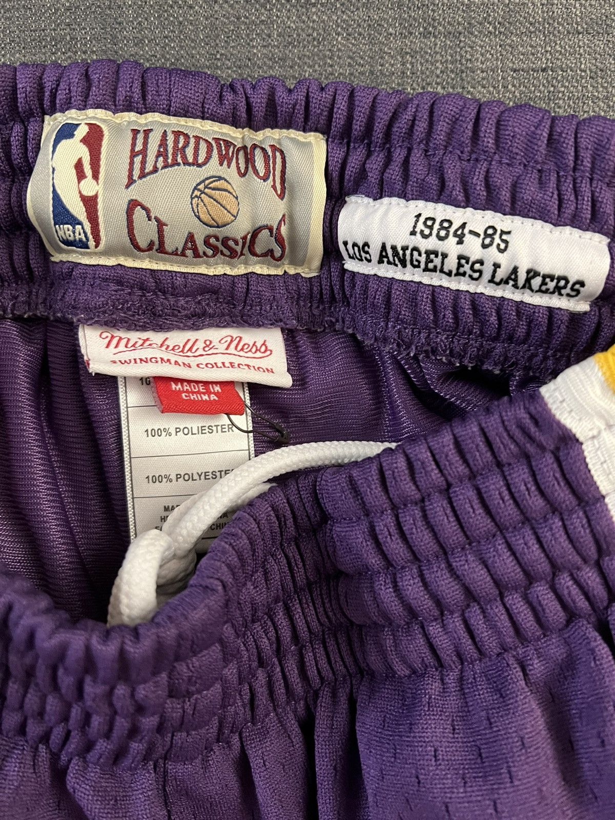 Mitchell & Ness Mitchell & Ness 1984-85 Lakers purple & gold shorts size S Size US 31 - 2 Thumbnail