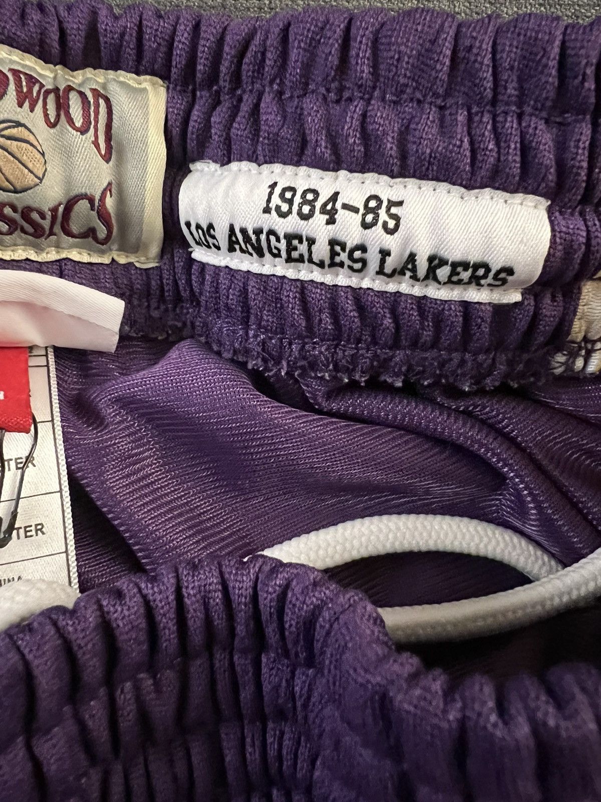 Mitchell & Ness Mitchell & Ness 1984-85 Lakers purple & gold shorts size S Size US 31 - 4 Thumbnail