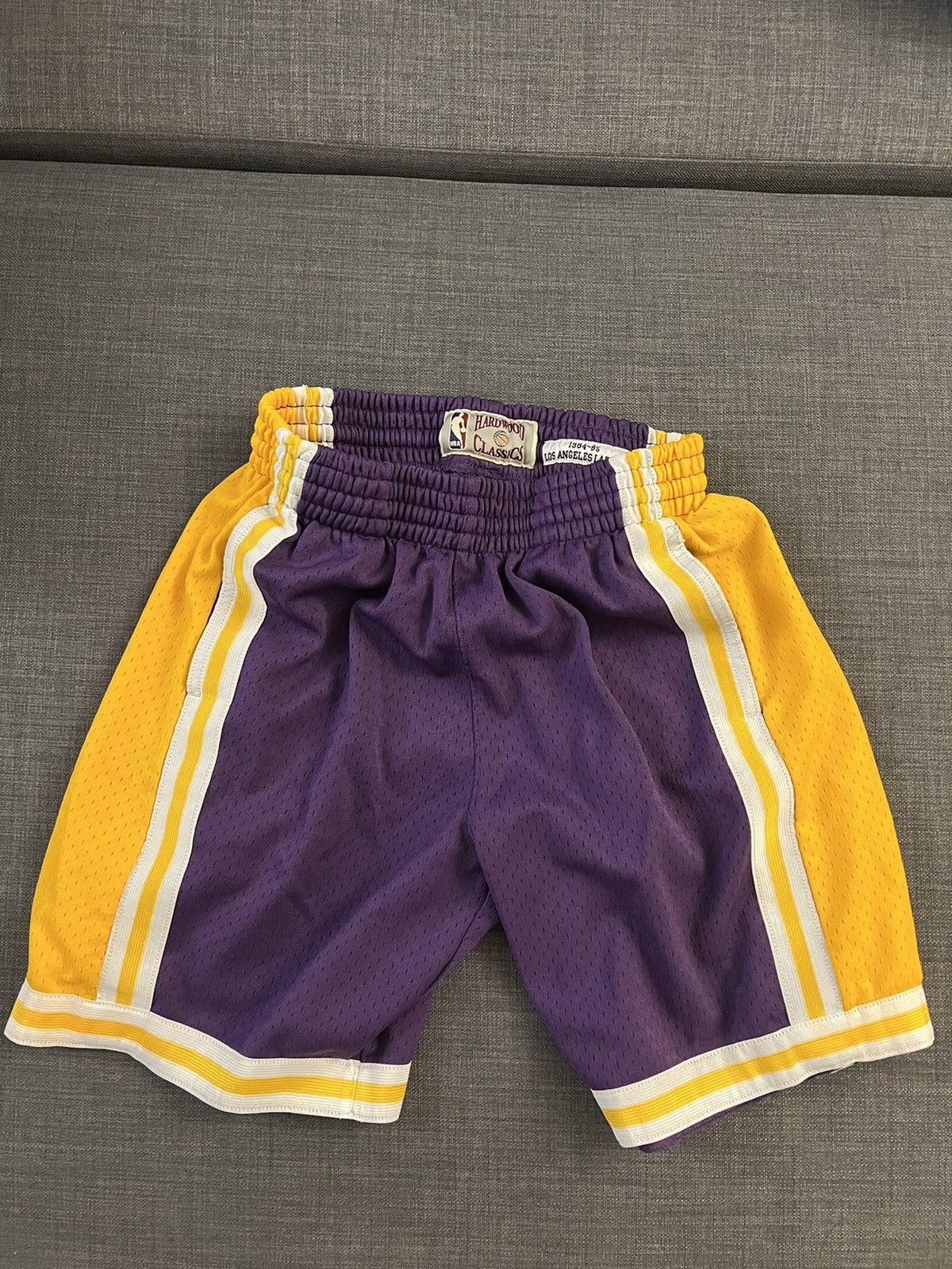 Mitchell & Ness Mitchell & Ness 1984-85 Lakers purple & gold shorts size S Size US 31 - 1 Thumbnail