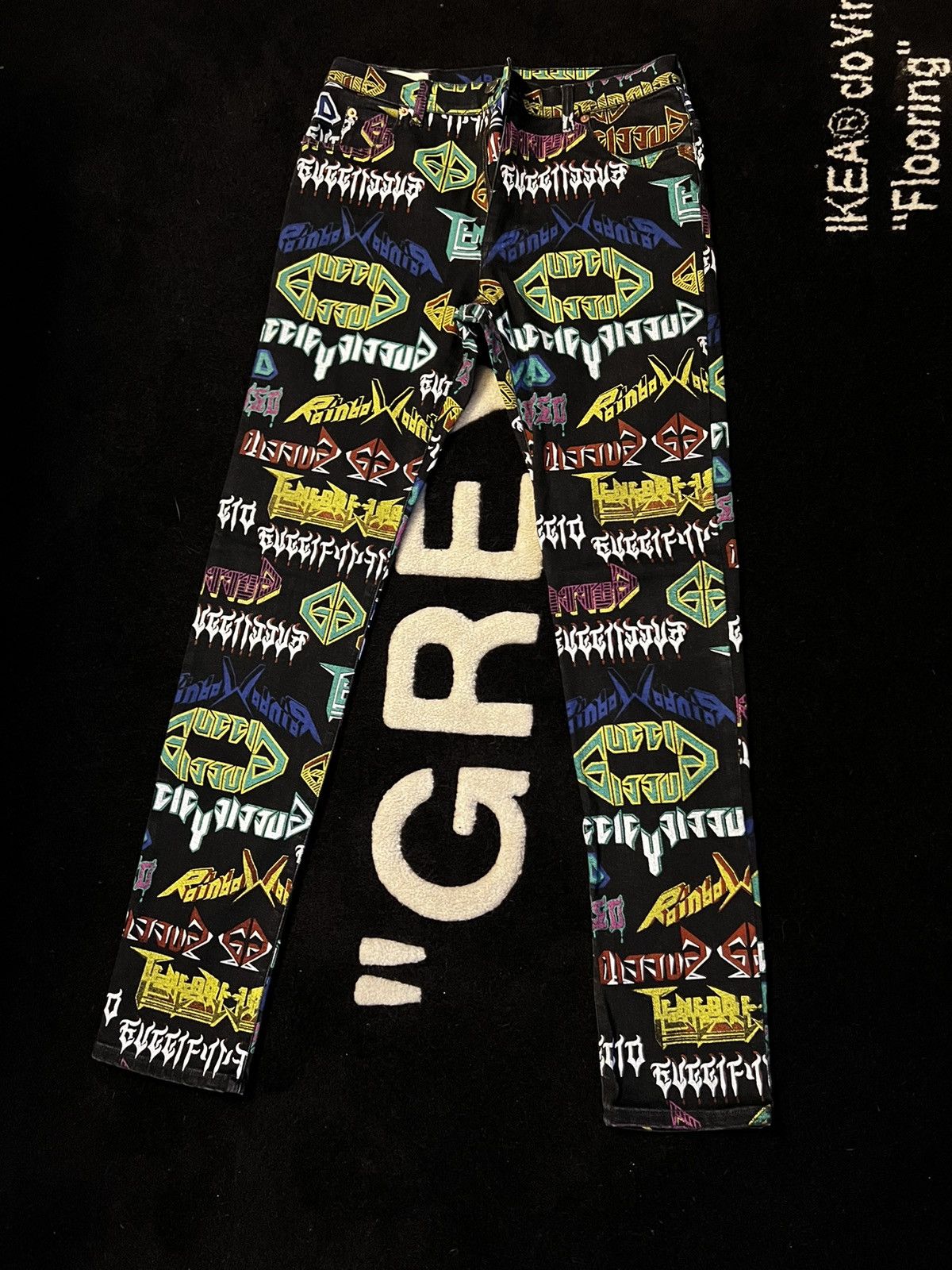 Gucci all over metal print jeans