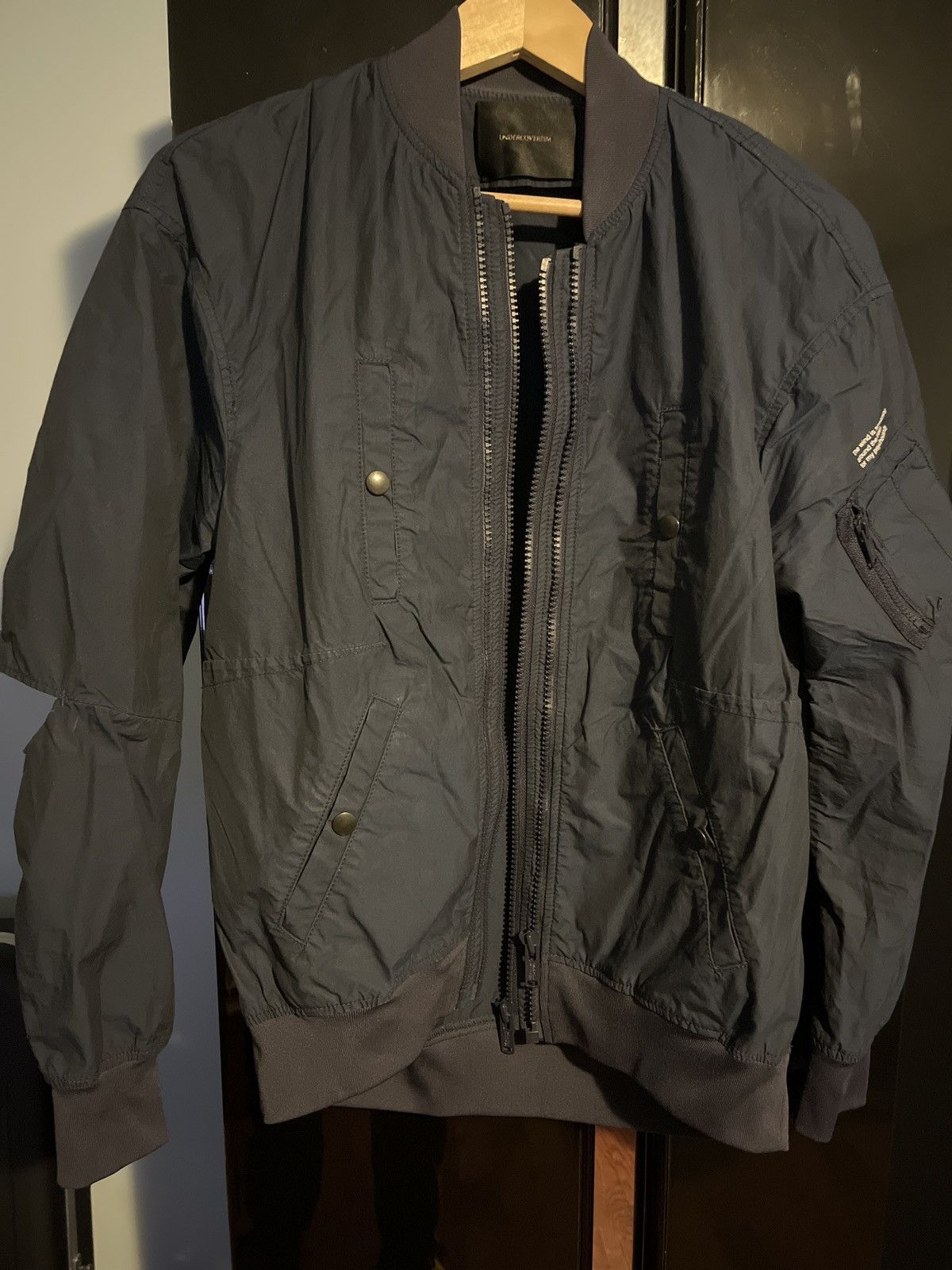 image of Undercover Ill Be A Plastic Toy Bomber (Sz2) in Blue, Men's (Size Medium)
