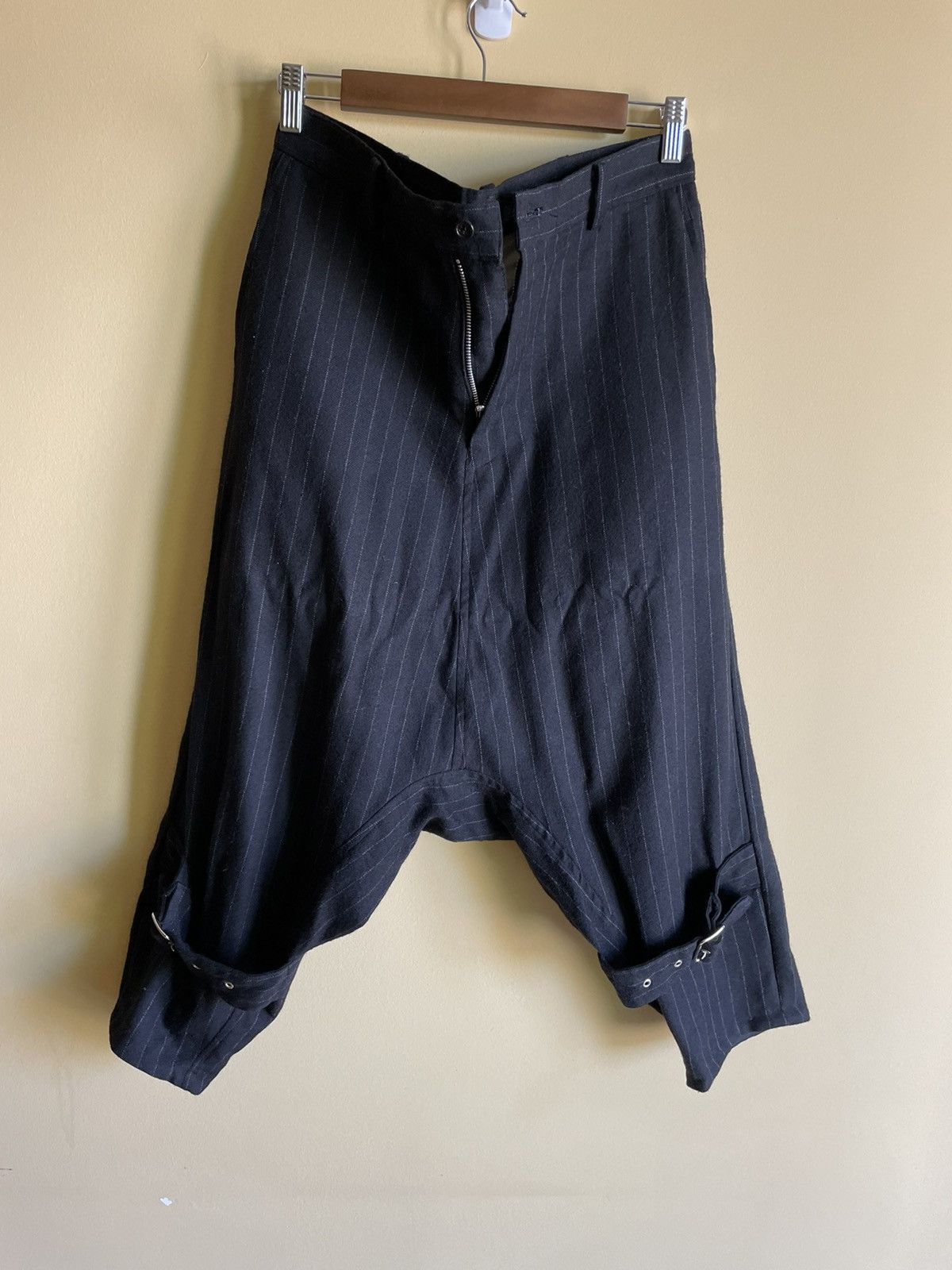 image of Comme Des Garcons Black Wool Cropped Drop Crotch Wool Trousers in Black, Men's (Size 29)