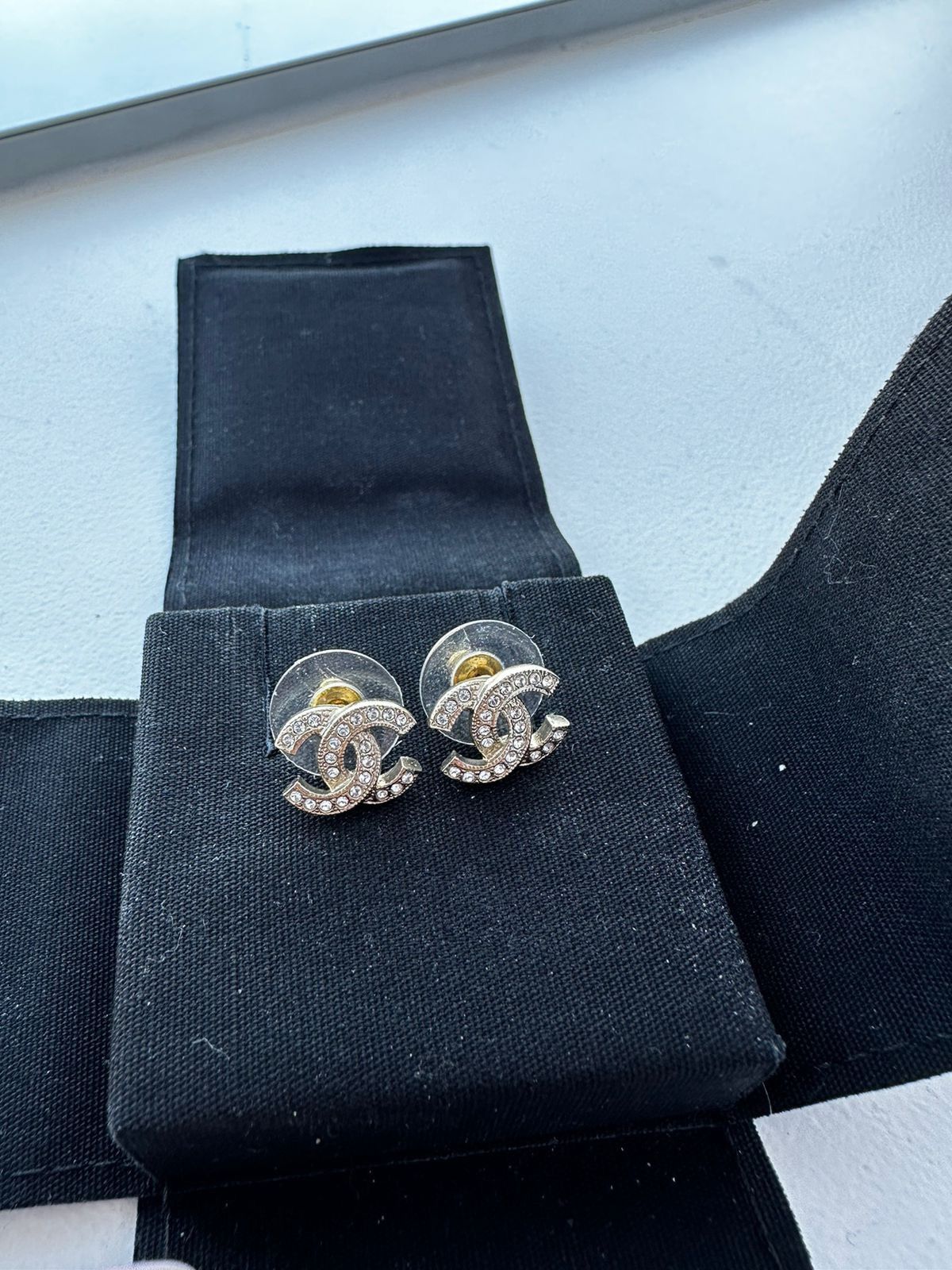 Chanel cc logo twisted earrings gold color