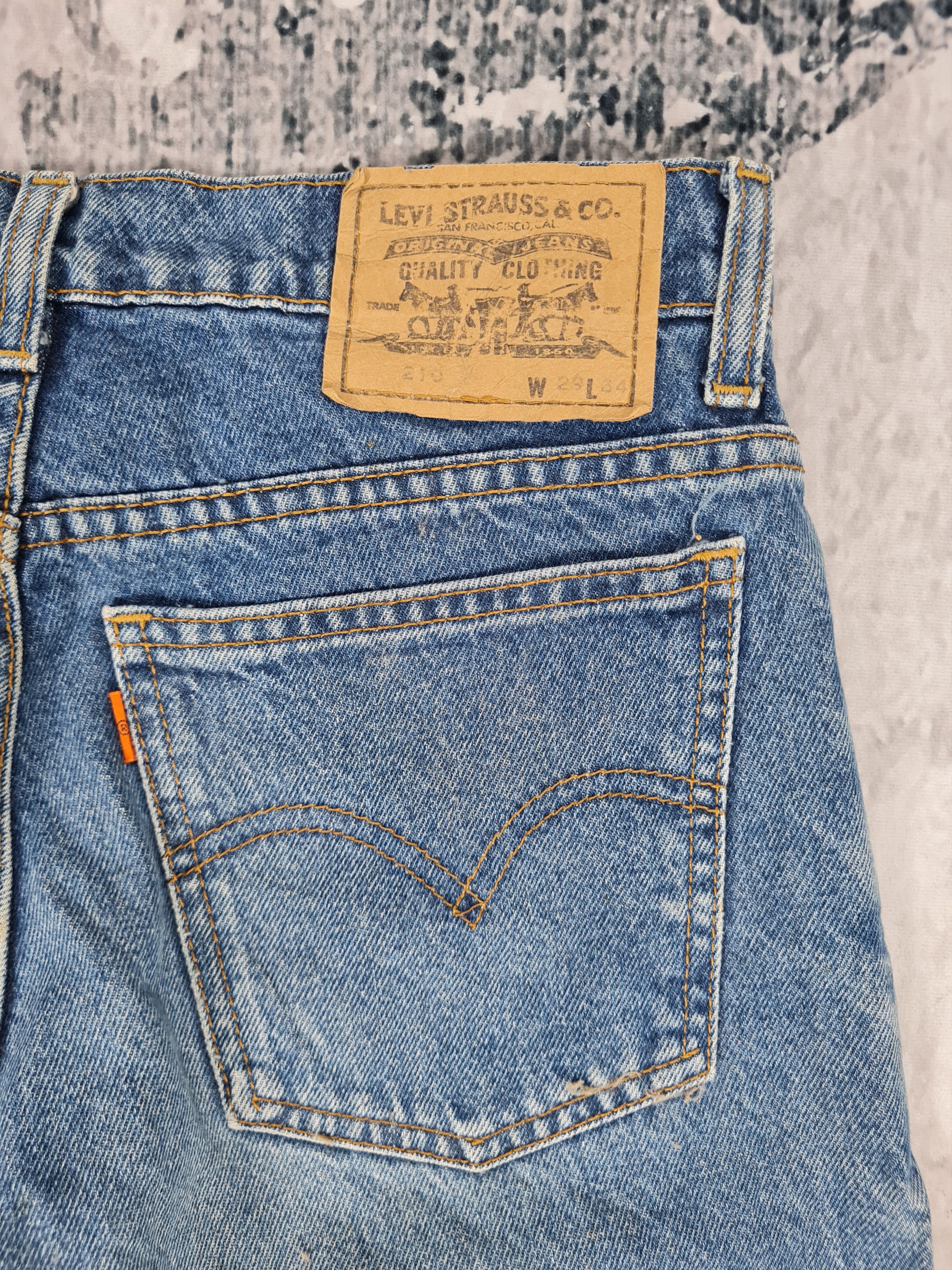Vtg LEVIS 210 Orange Tab Sun Faded Size 28x28 Jeans L0043