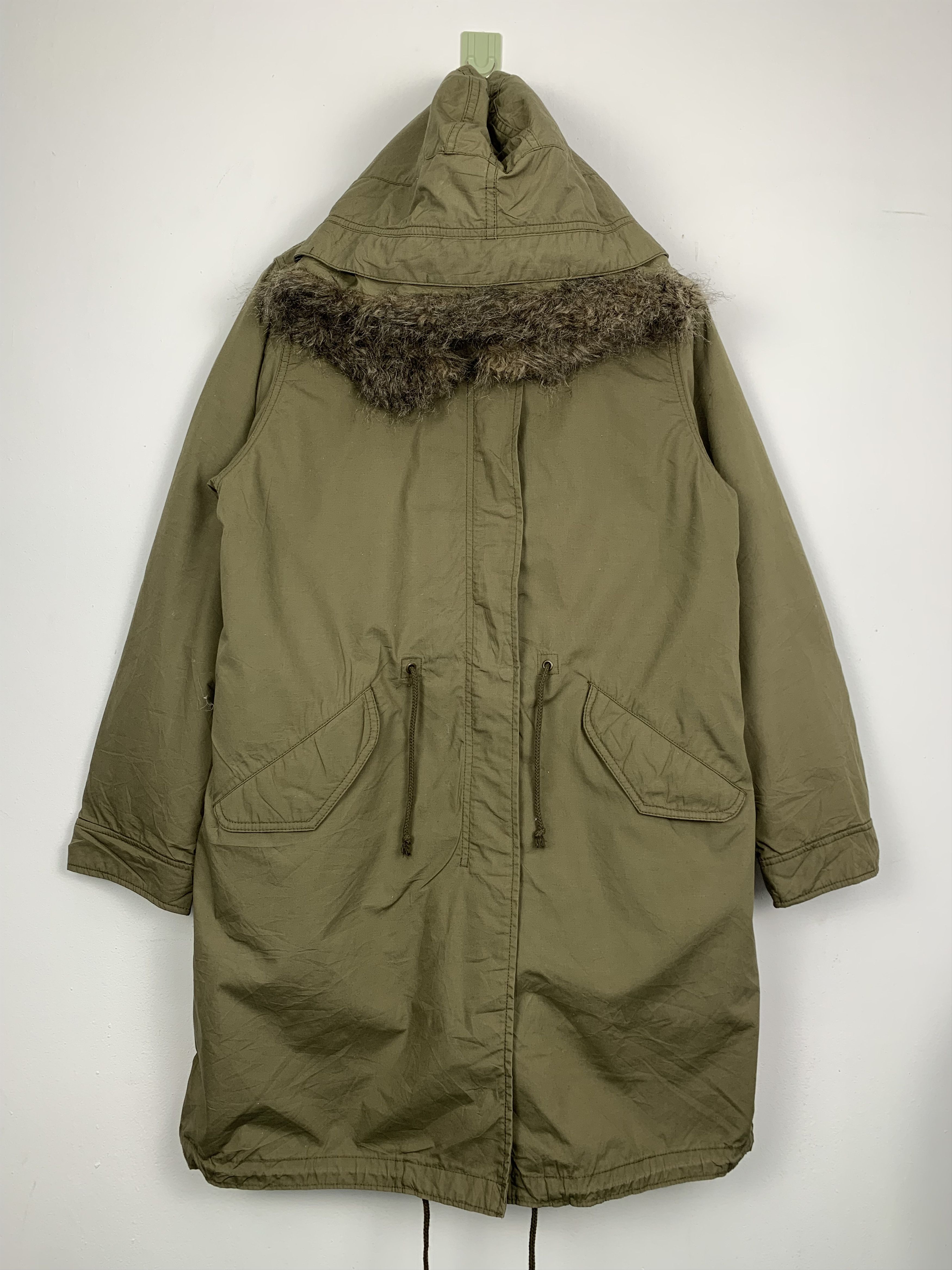 image of Vintage Uniqlo Sherpa Lining Zip Up Hoodie Parkas Jacket in Military Green, Men's (Size Medium)