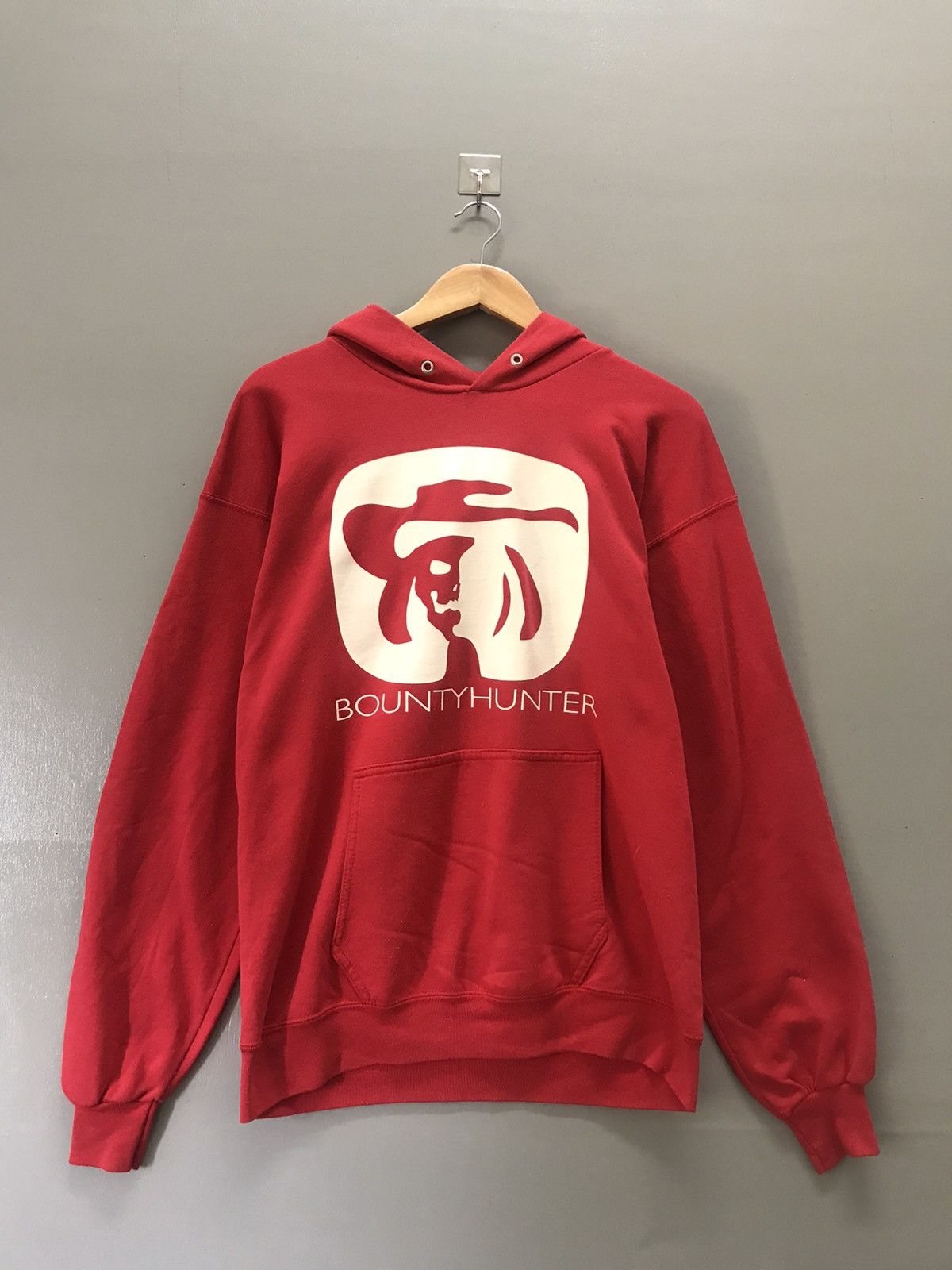 image of 90's Bounty Hunter Skull Cowboy Hoodies in Red, Men's (Size Large)