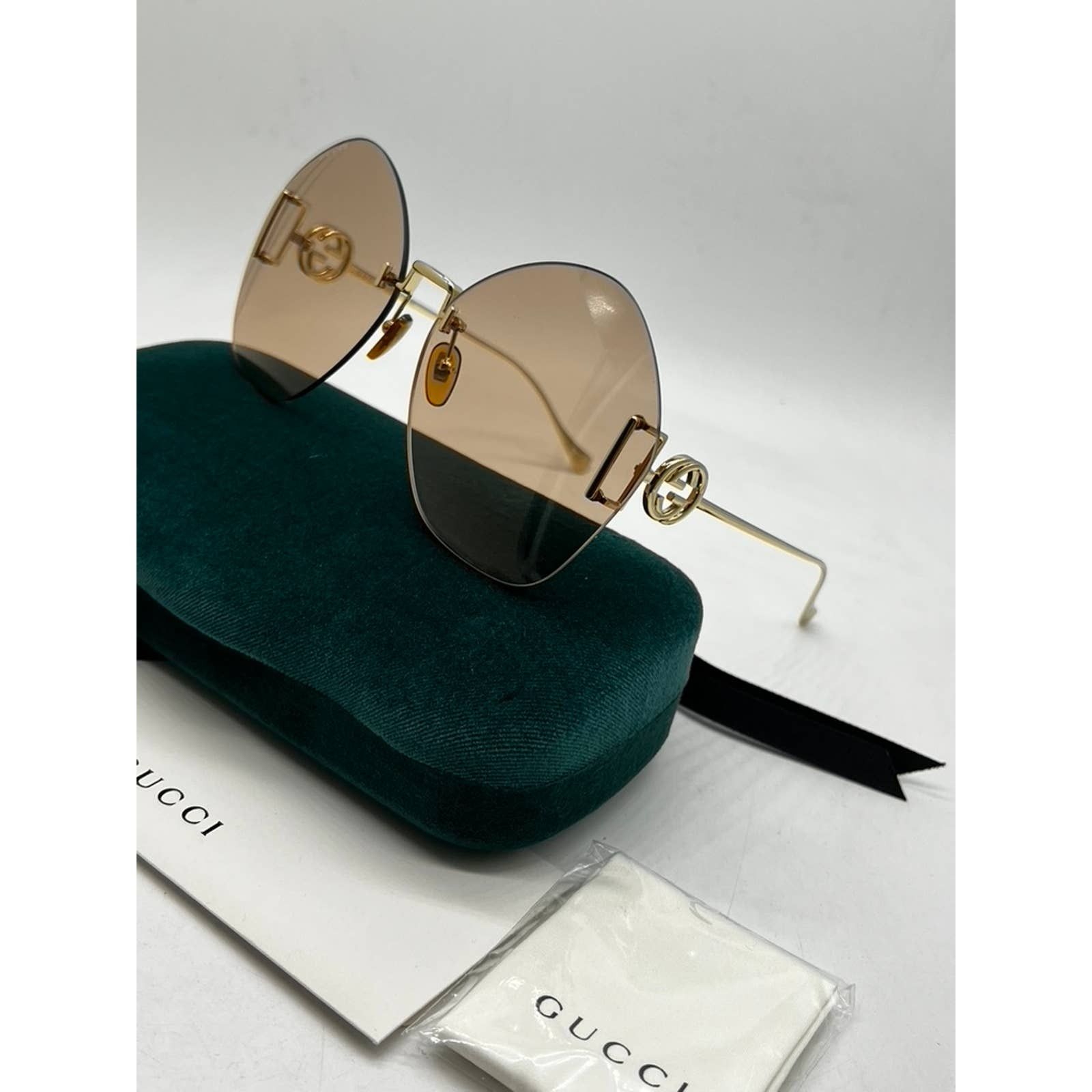 Gucci round rimless sunglasses clearance