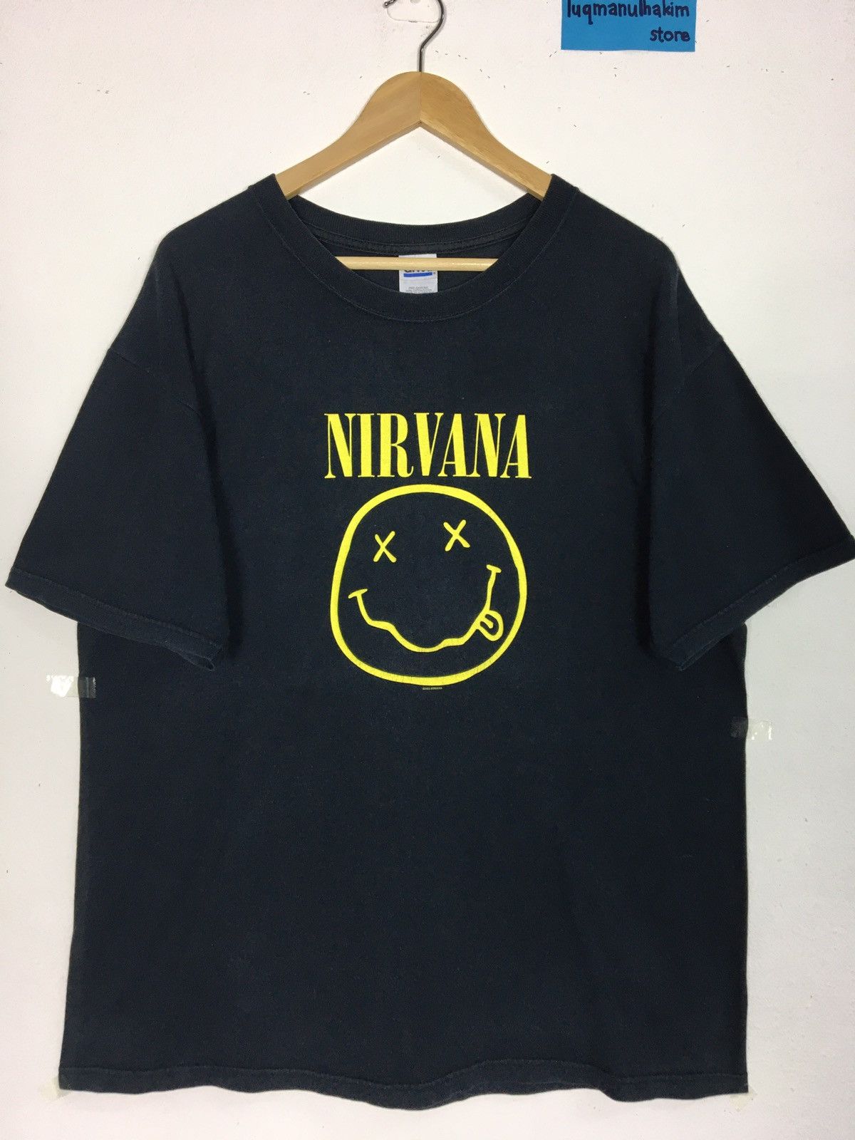 image of Band Tees x Nirvana 2003 Nirvana Tee Vintage Smiley Face Band Tee in Black, Men's (Size Large)