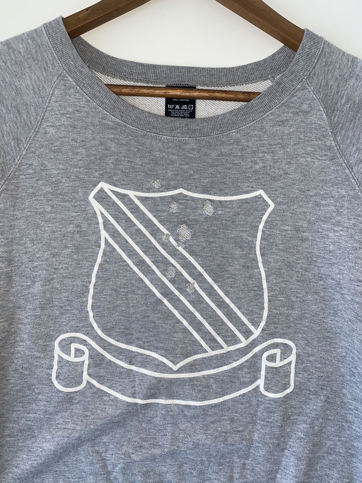 Number (N)ine shield bullet hole sweater