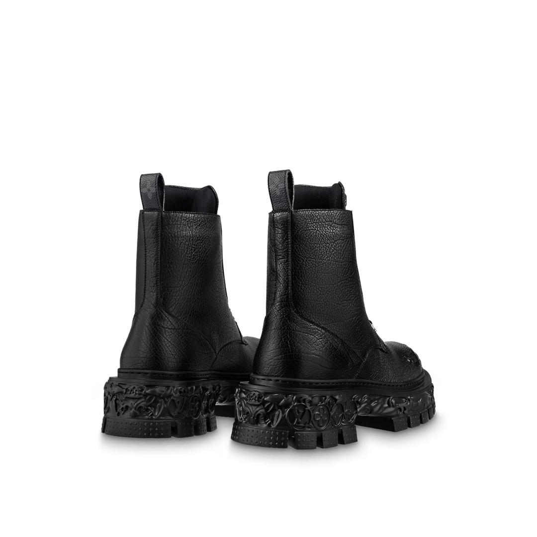 The LV Baroque ankle boot is a military-inspired, hybrid style which was  first seen on Louis Vuitton's Fall-Winter 2022 runway. This season, its  calf-leather upper features a hand-crafted vintage effect, which brings