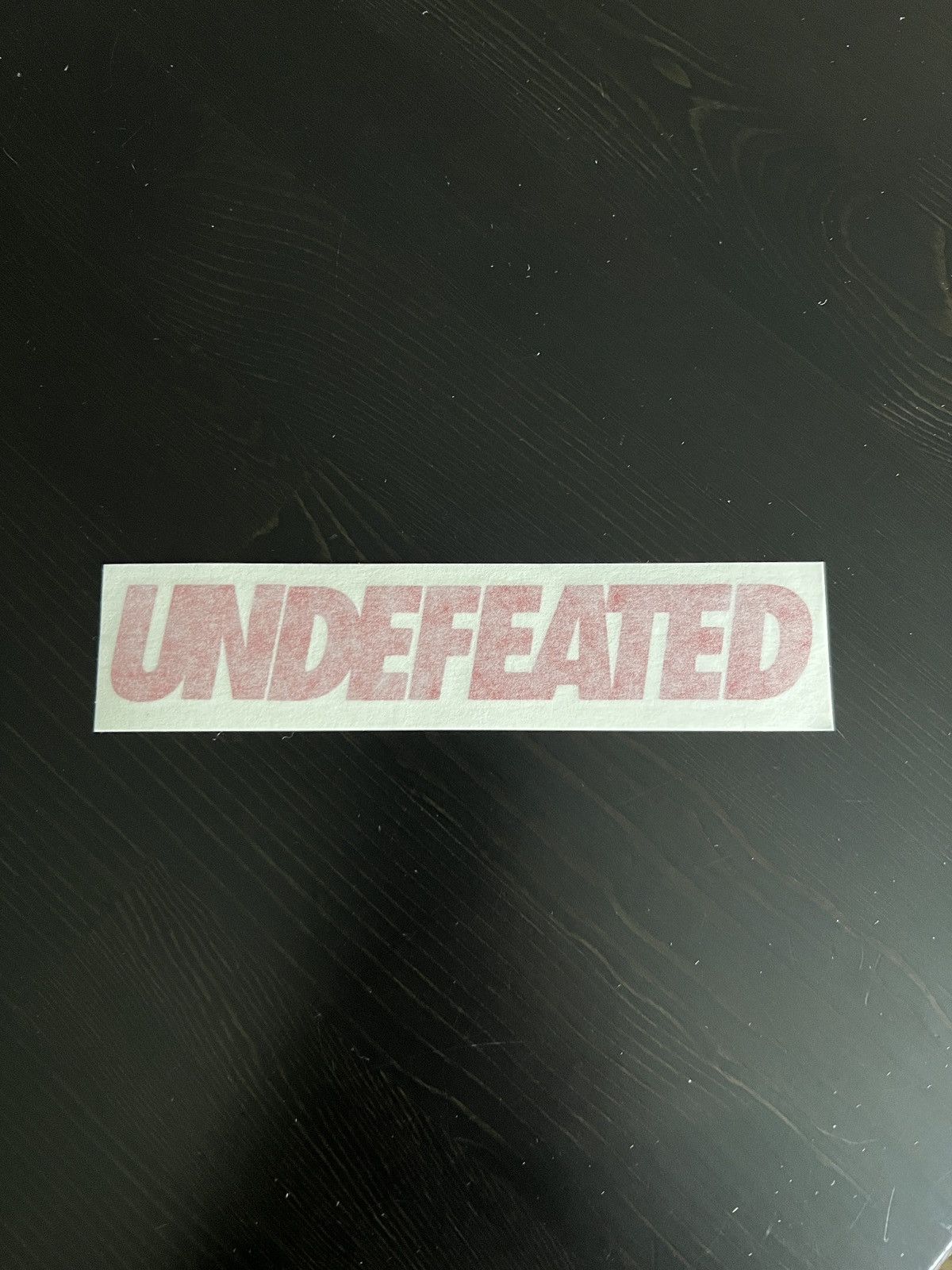undefeated raffle off white