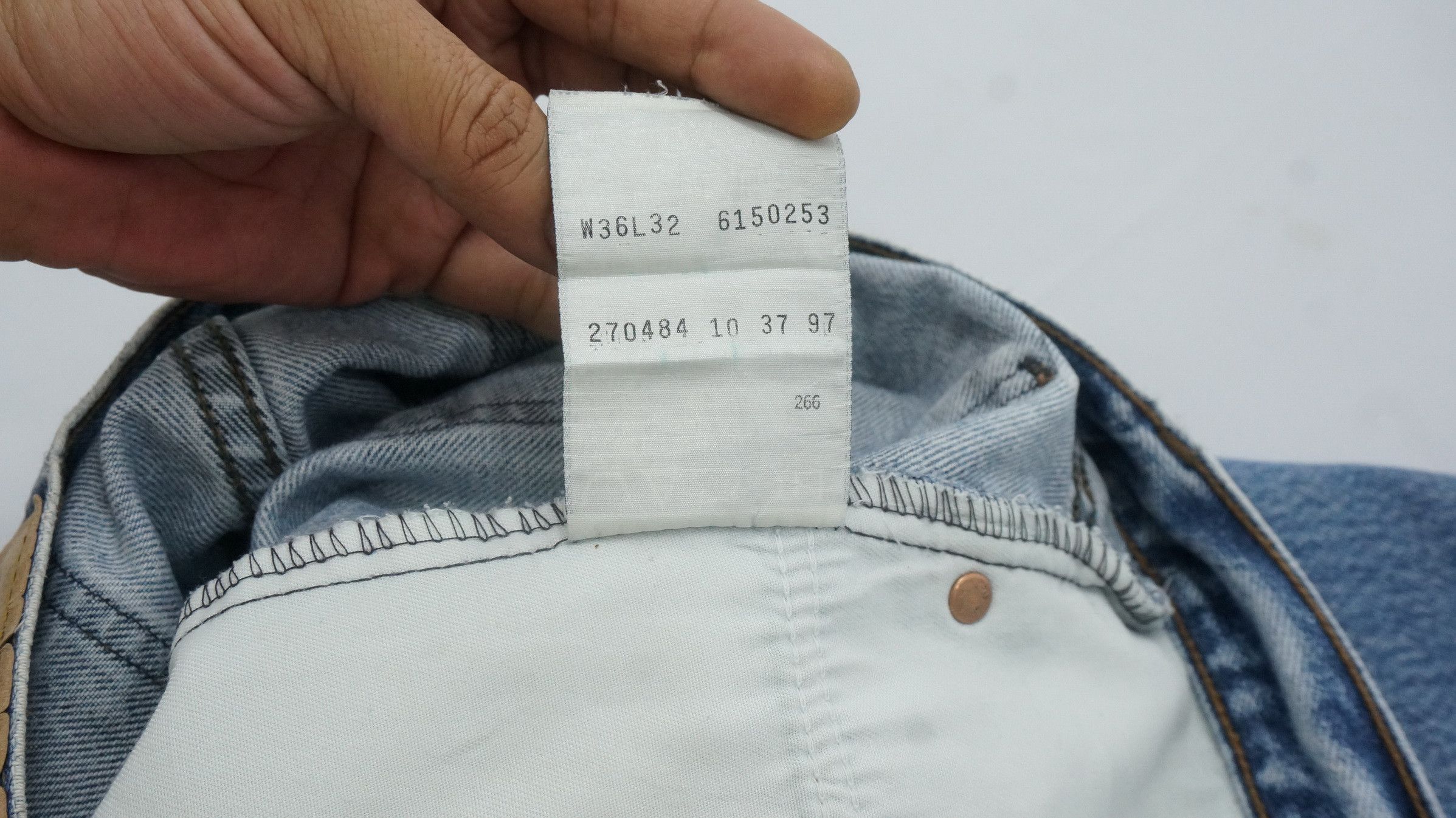 - 90s Vintage Levi's 615 Ripped Jeans