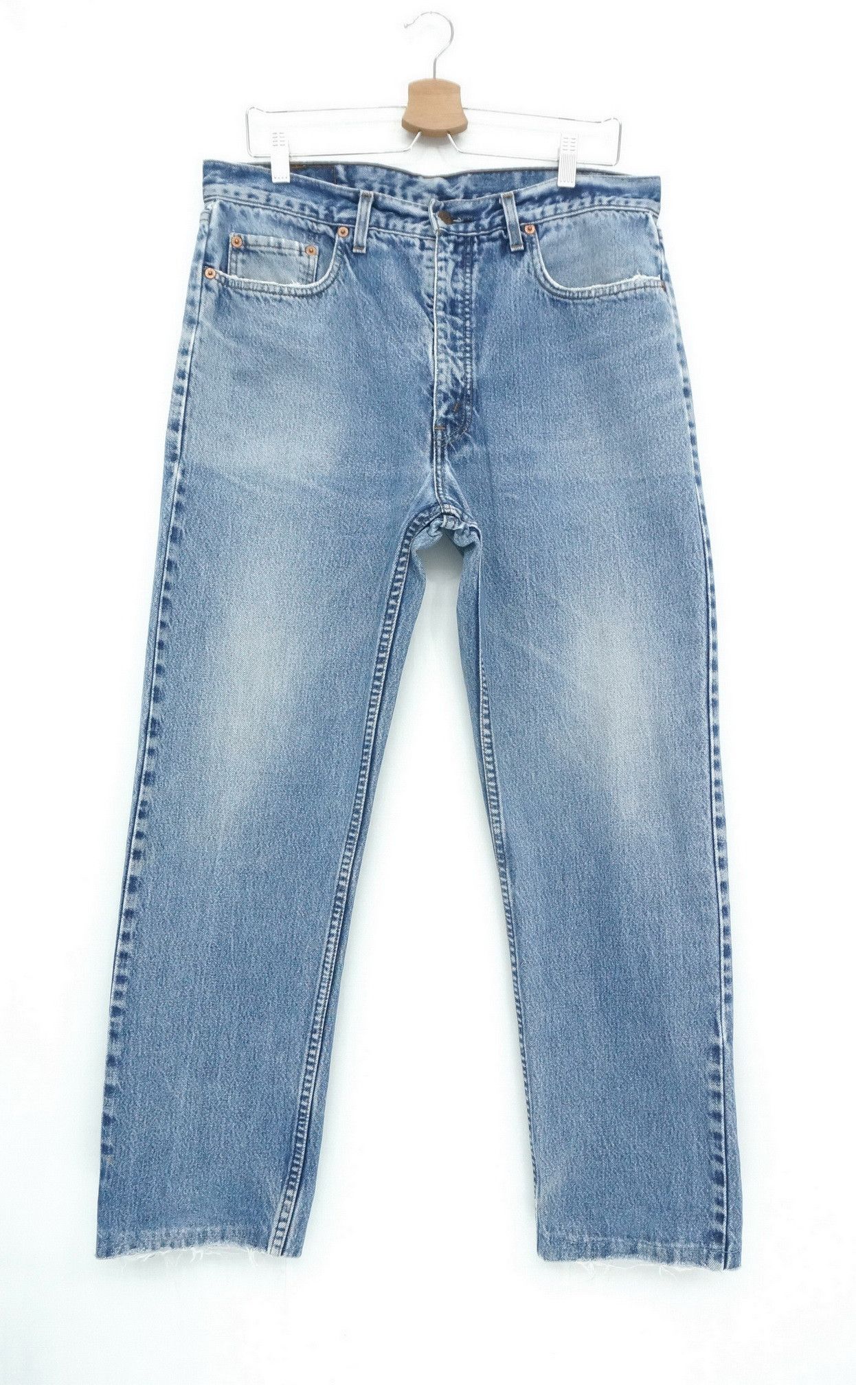 - 90s Vintage Levi's 615 Ripped Jeans