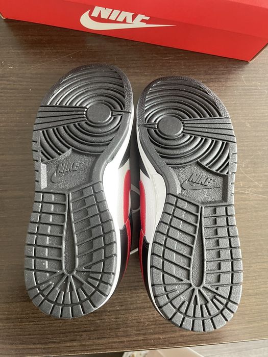 dunk with red toe and brown swoosh