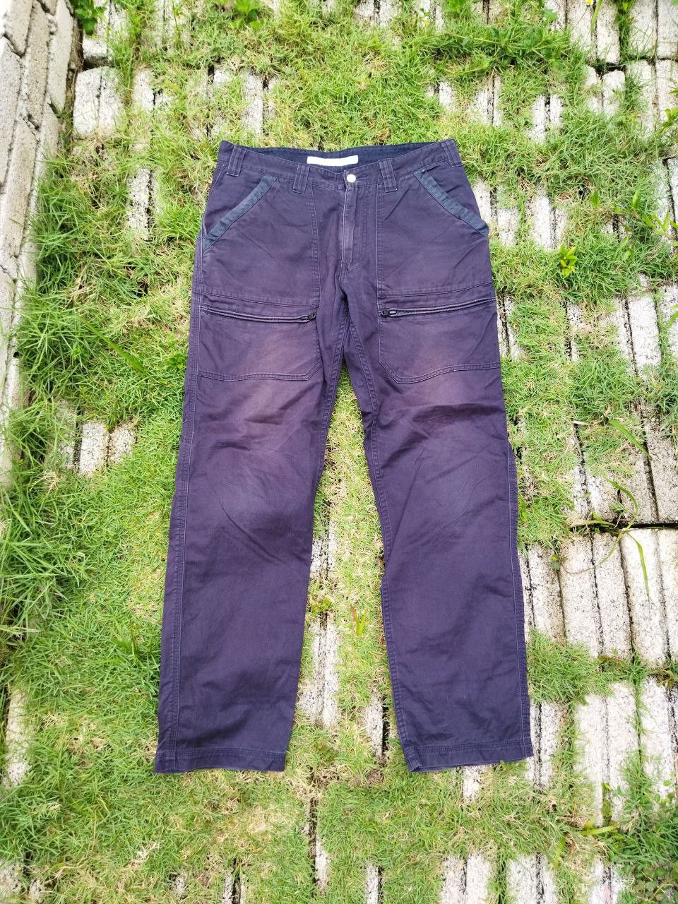 image of Vintage x White Mountaineering Sunfaded 6 Pocket Pants in Blue Distressed, Men's (Size 33)