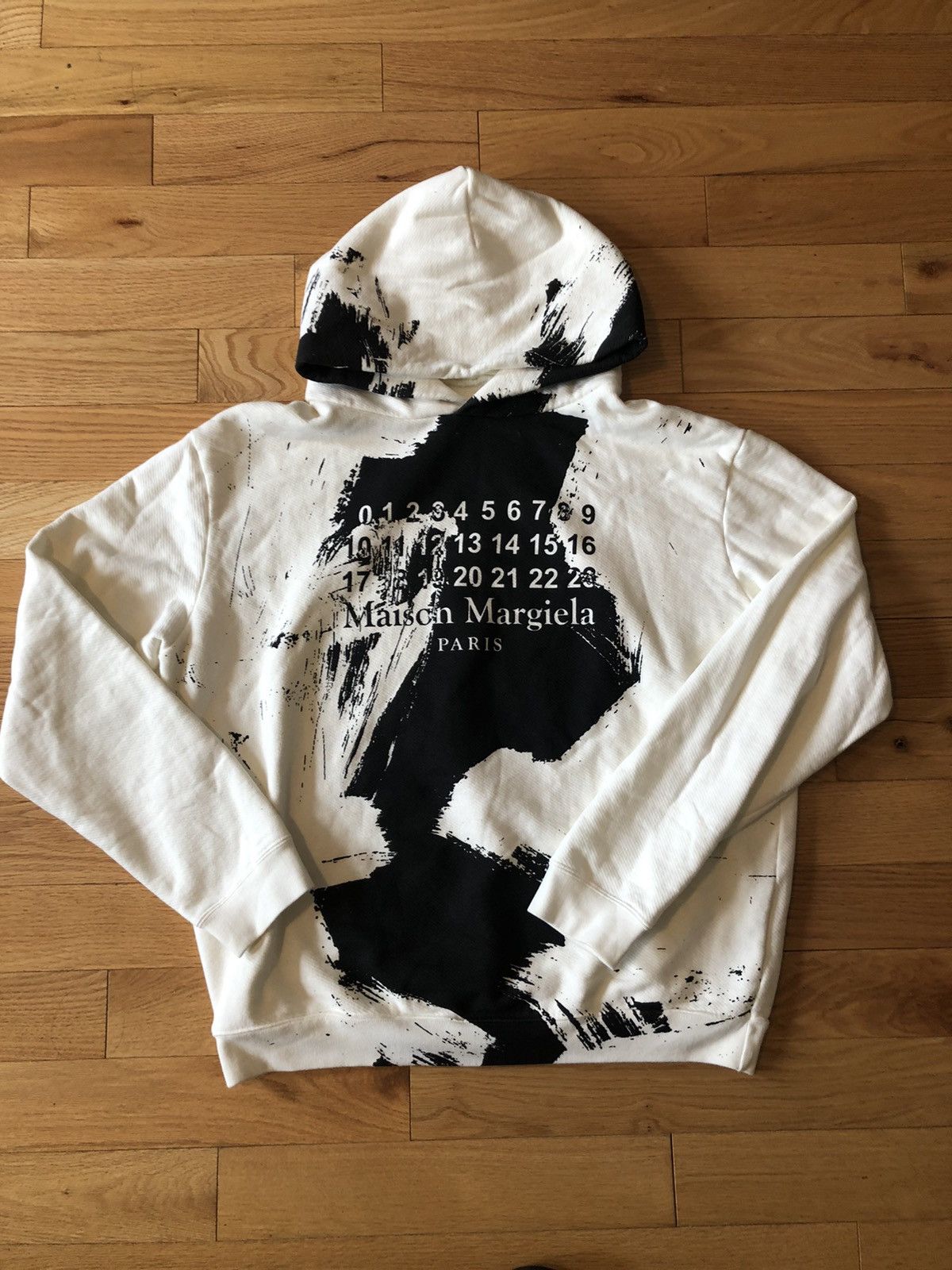 Maison Margiela Maison Margiela Splatter paint-effect hoodie | Grailed