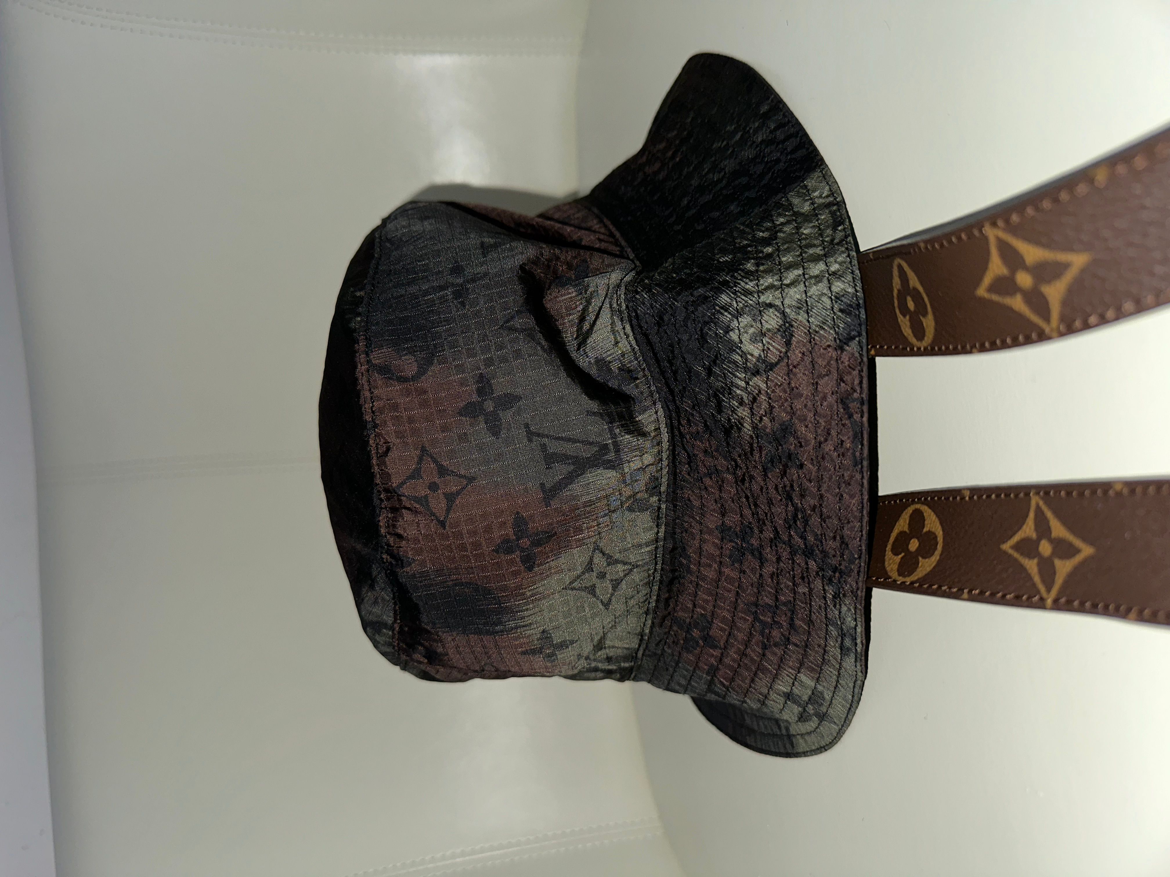 Louis Vuitton IKAT MONOGRAM CAMOUFLAGE Bucket Hat with Signature Straps. 58