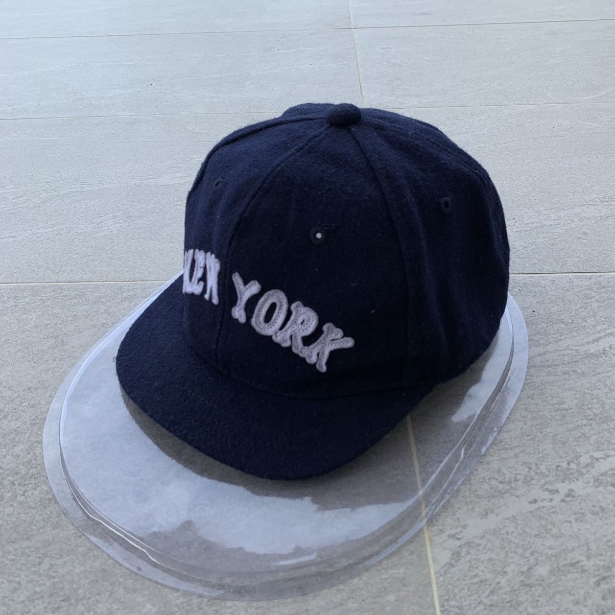 BLUE cap spell out new york logo.. wool material..