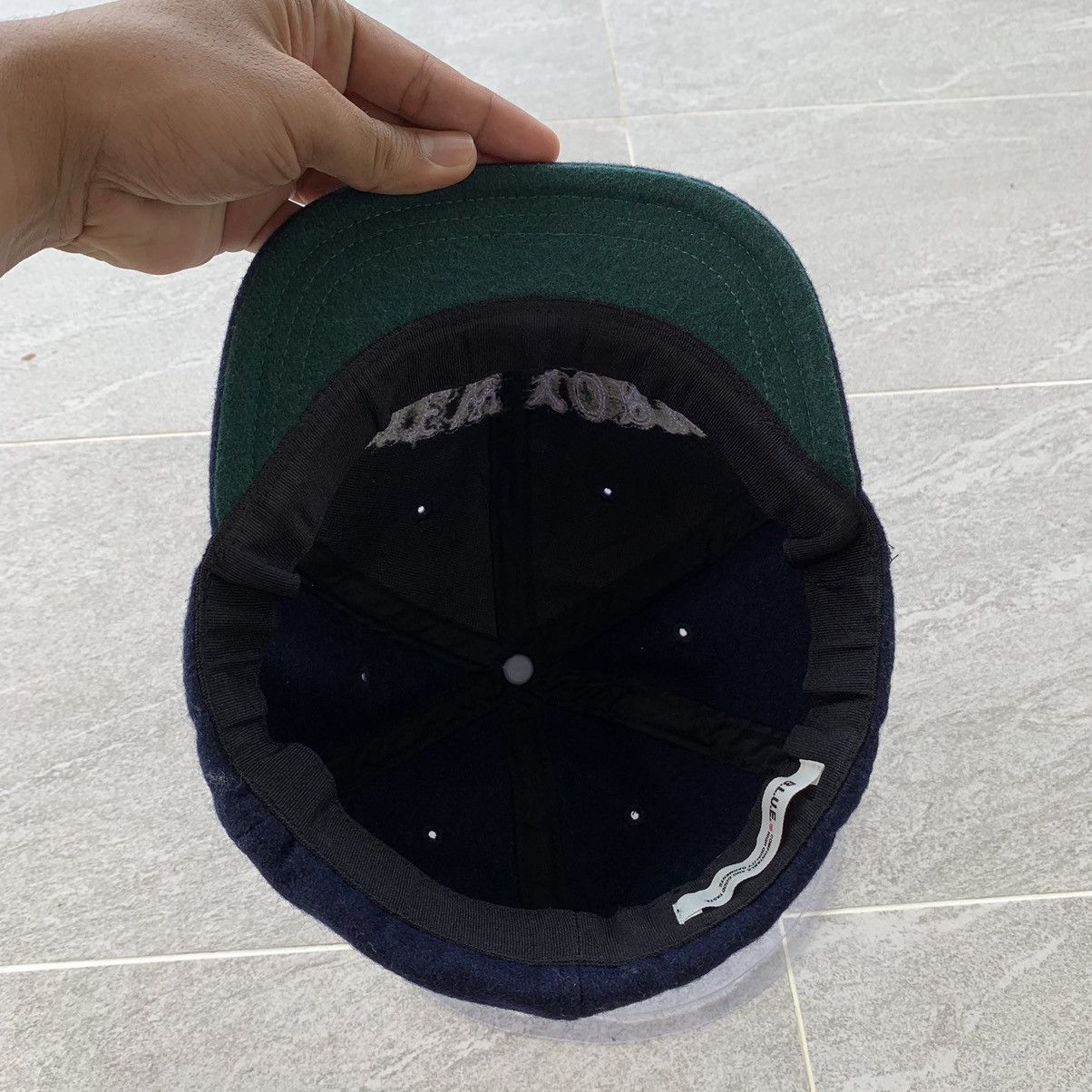BLUE cap spell out new york logo.. wool material..