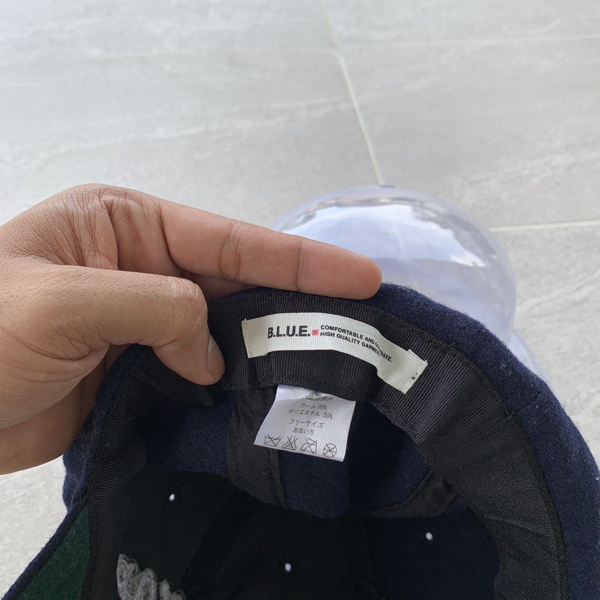 BLUE cap spell out new york logo.. wool material..
