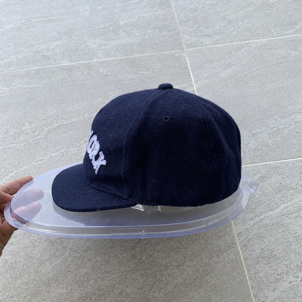 BLUE cap spell out new york logo.. wool material..