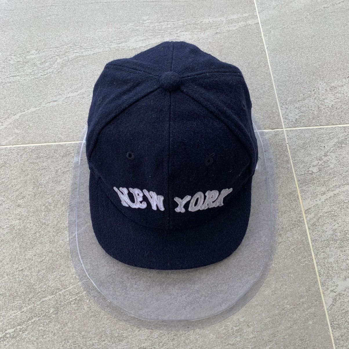 BLUE cap spell out new york logo.. wool material..